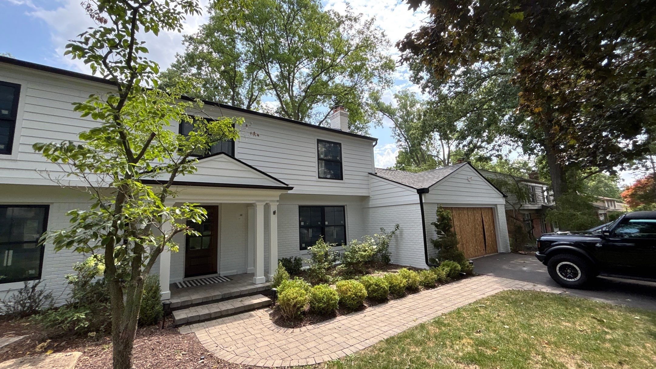 Siding Replacement using Hardie Plank S8 1/4"  Arctic White by 180 Contractors