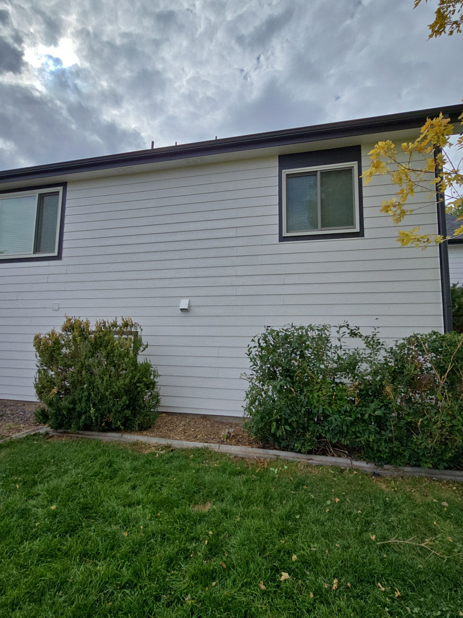 From Faded to Timeless: White & Black Exterior Renewal by J&M Painting LLC