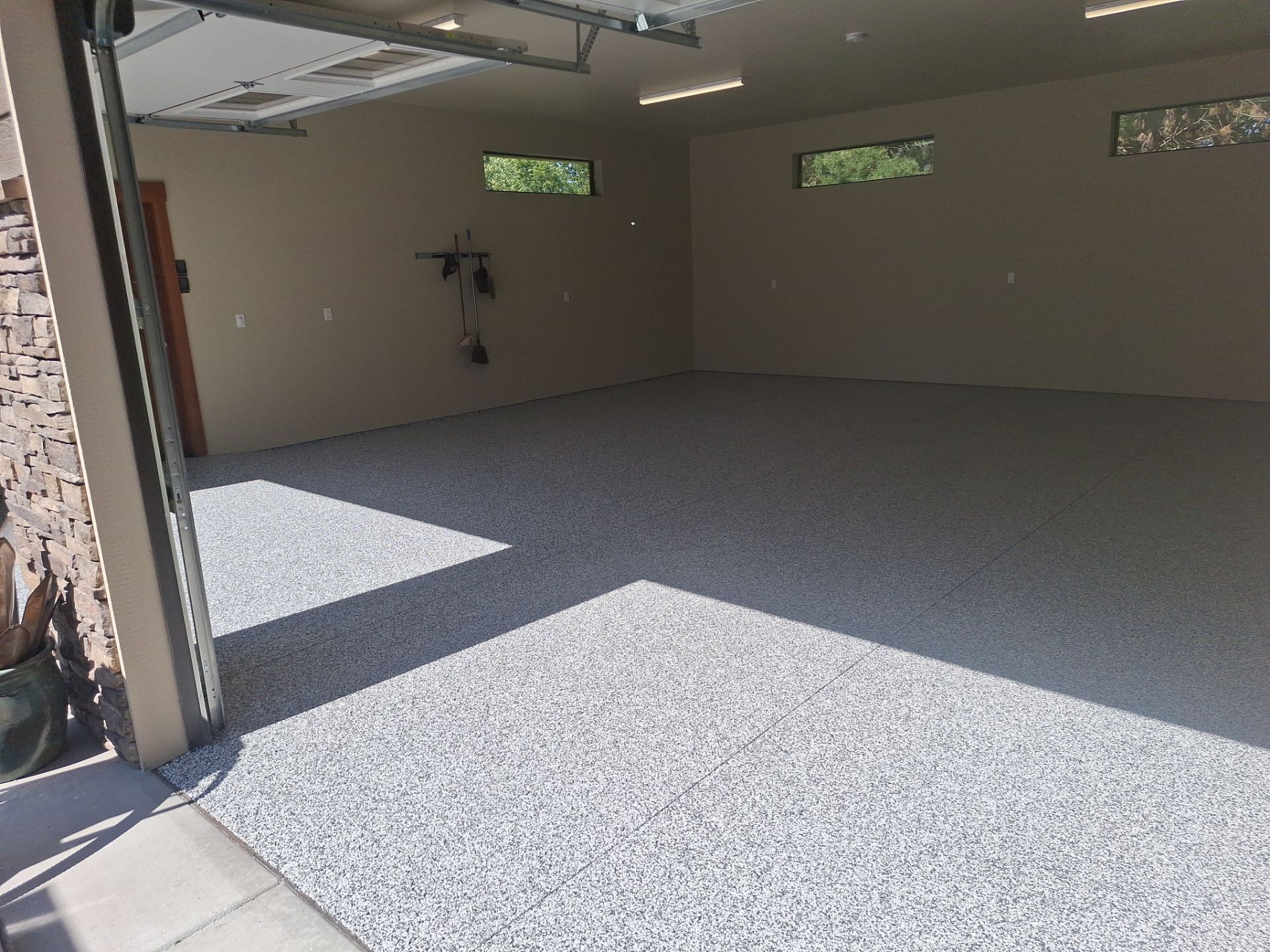 Garage Transformation using Domino by Croc Coatings, LLC