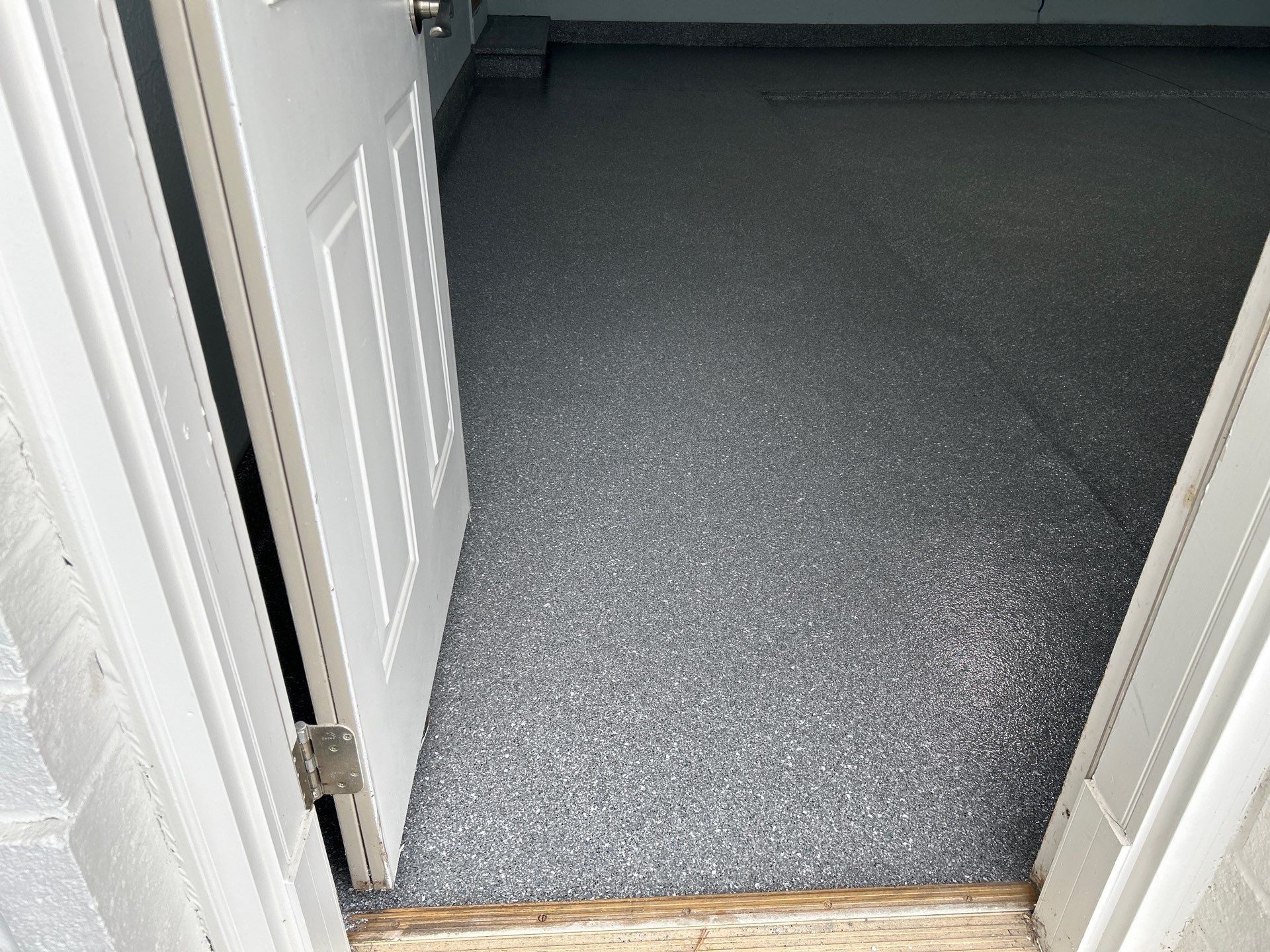 Turquoise Floor Coating in Elkhart! by Innovative Spaces / Innovative Concrete Coatings