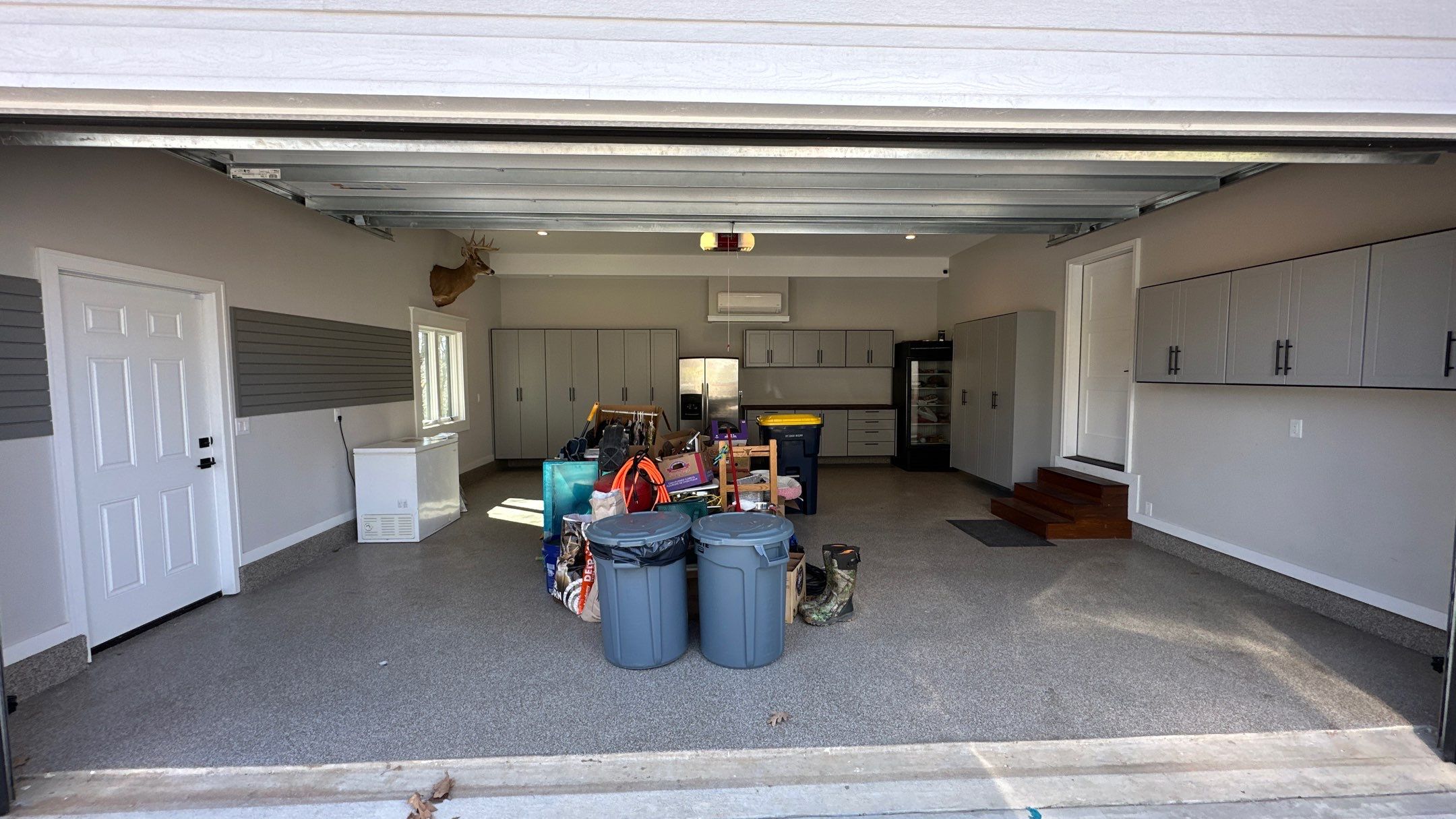 Robert B. upgraded his garage with cabinets and slotwall by Banner Garage