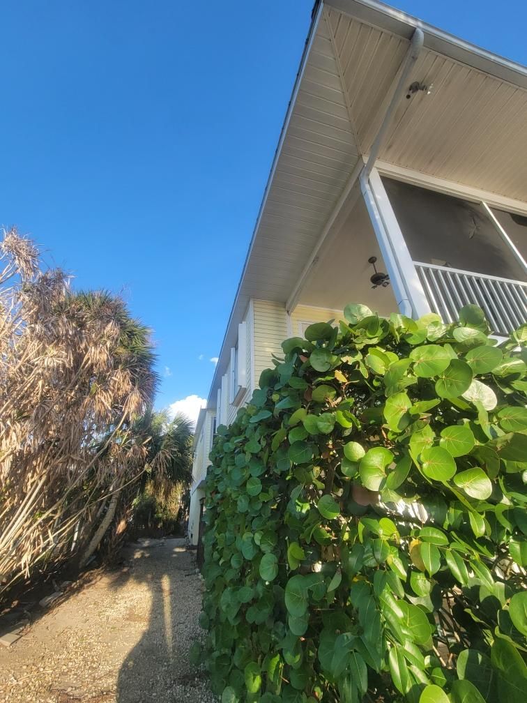 White Gutters with Matching Downspouts in Sarasota FL by Gutter Professors