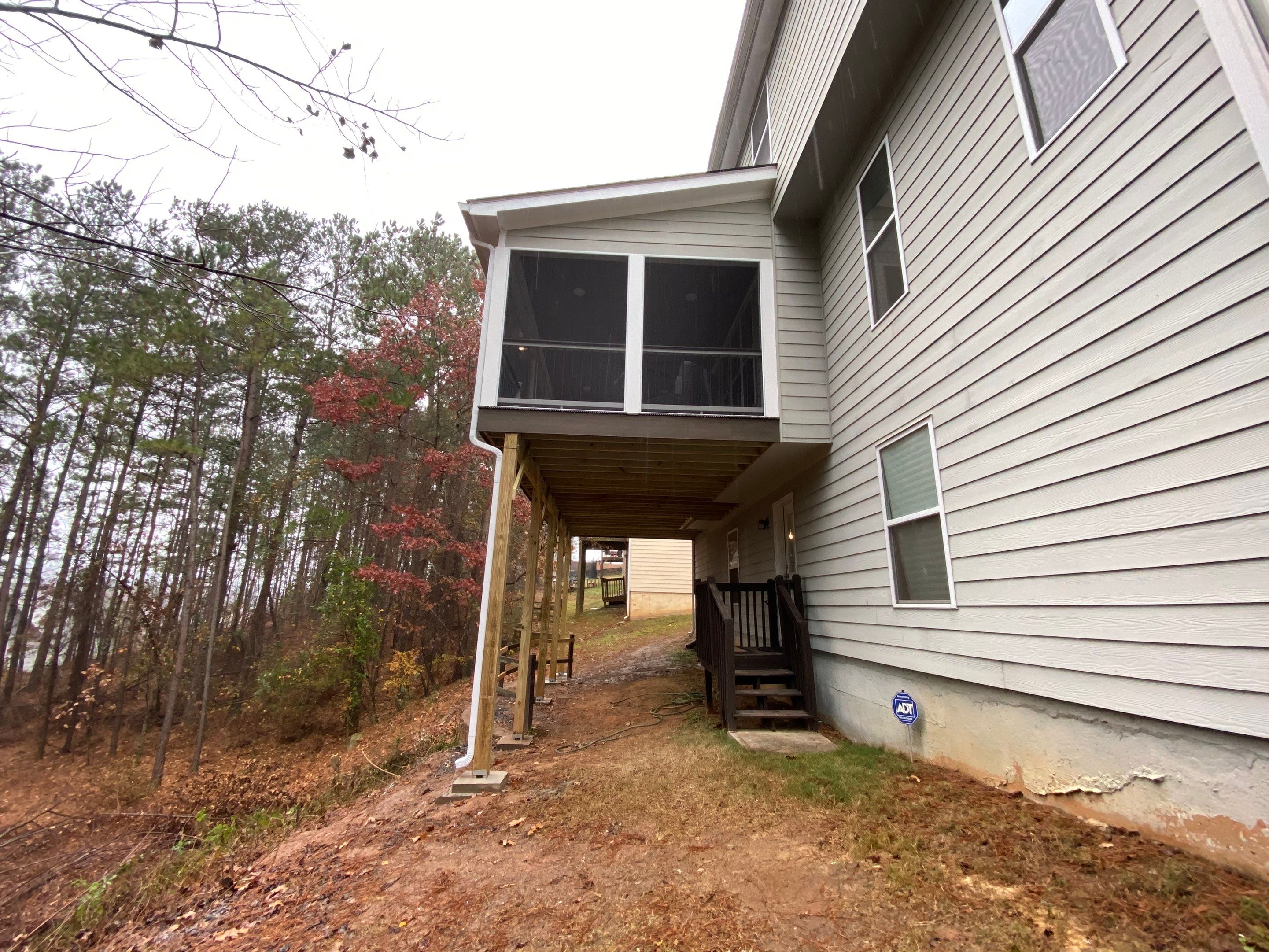 Elevated Screened Porch and Composite Deck Installation in Dallas by Swift Home Renovations