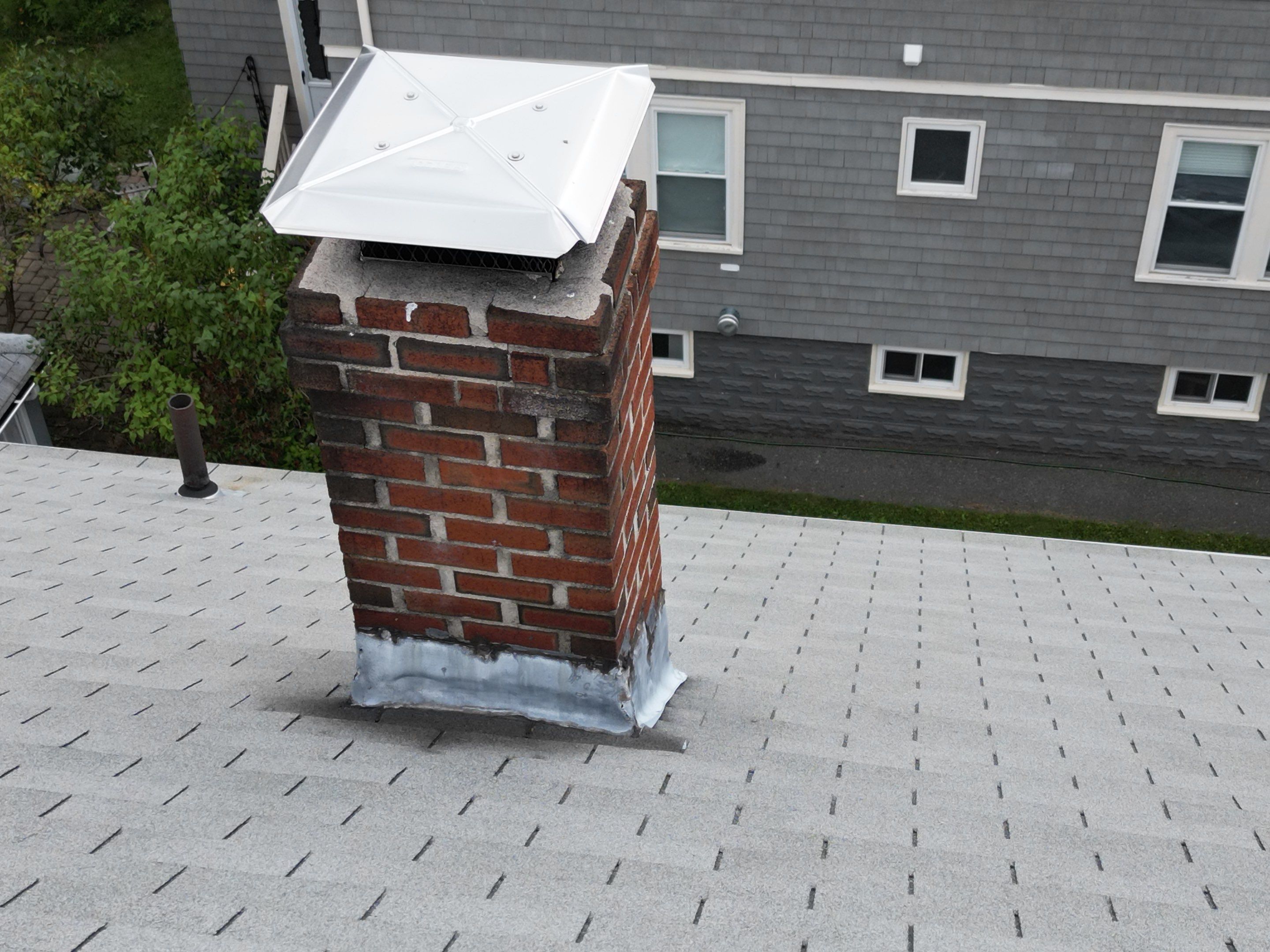 Arlington Roof Repair: Pipe Boot & Broan Vent Installation by Mighty Dog Roofing of Greater Middlesex County
