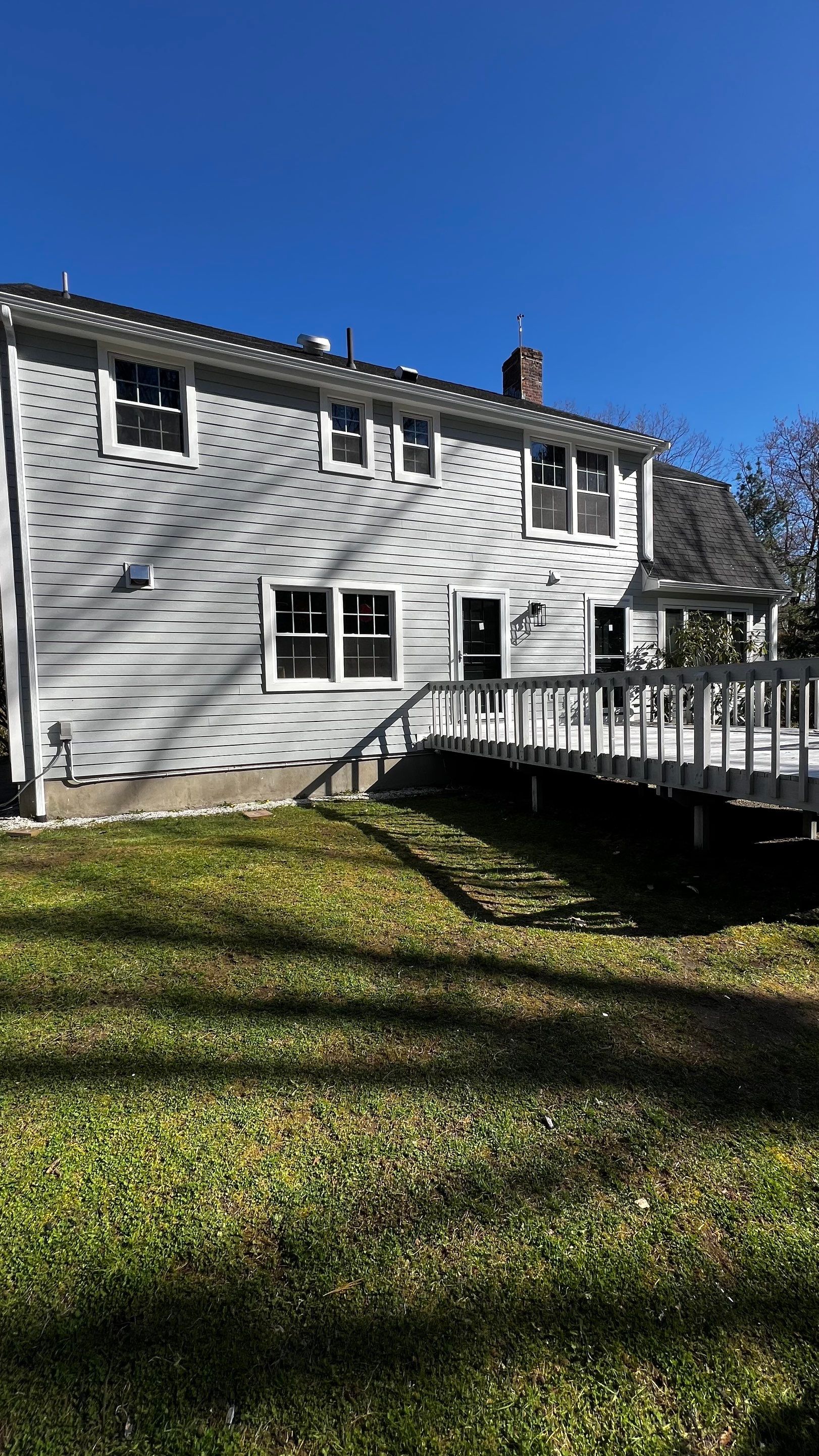 Custom window trim work and siding replacement in Dover, MA by UBrothers Construction