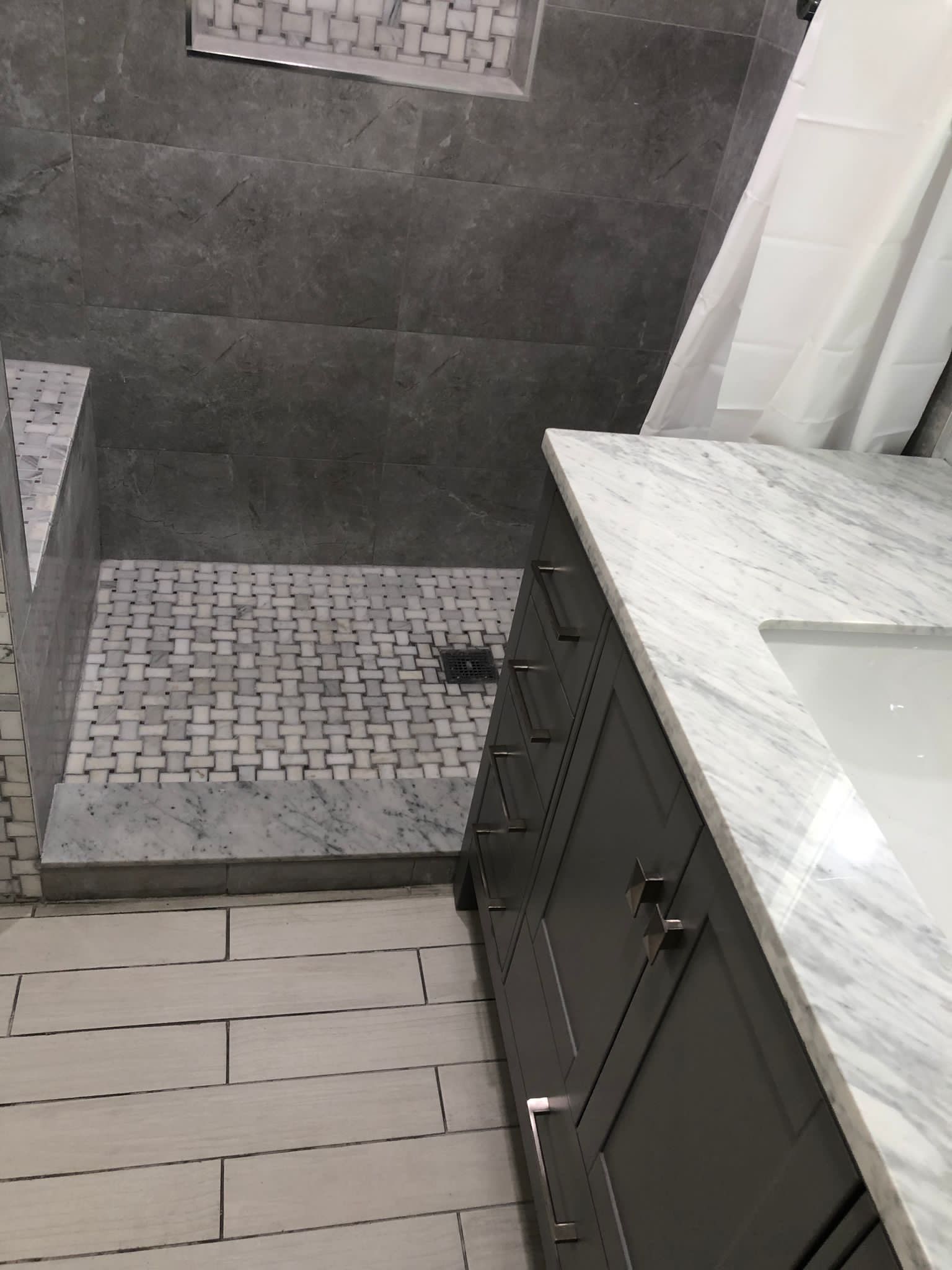 Bathroom Remodel using Tile by Home Concepts Construction