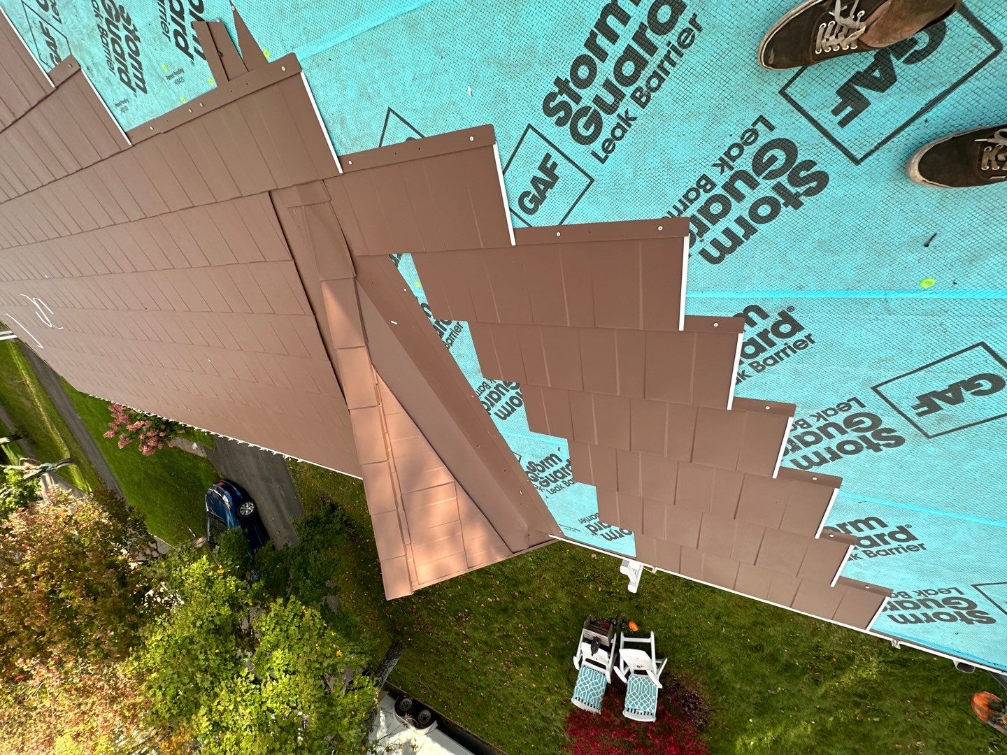 Residential Roofing Installation using Wakefield Bridge Steel Shingle by Ideal Steel by Artisan Roofing & Home Improvements Inc.