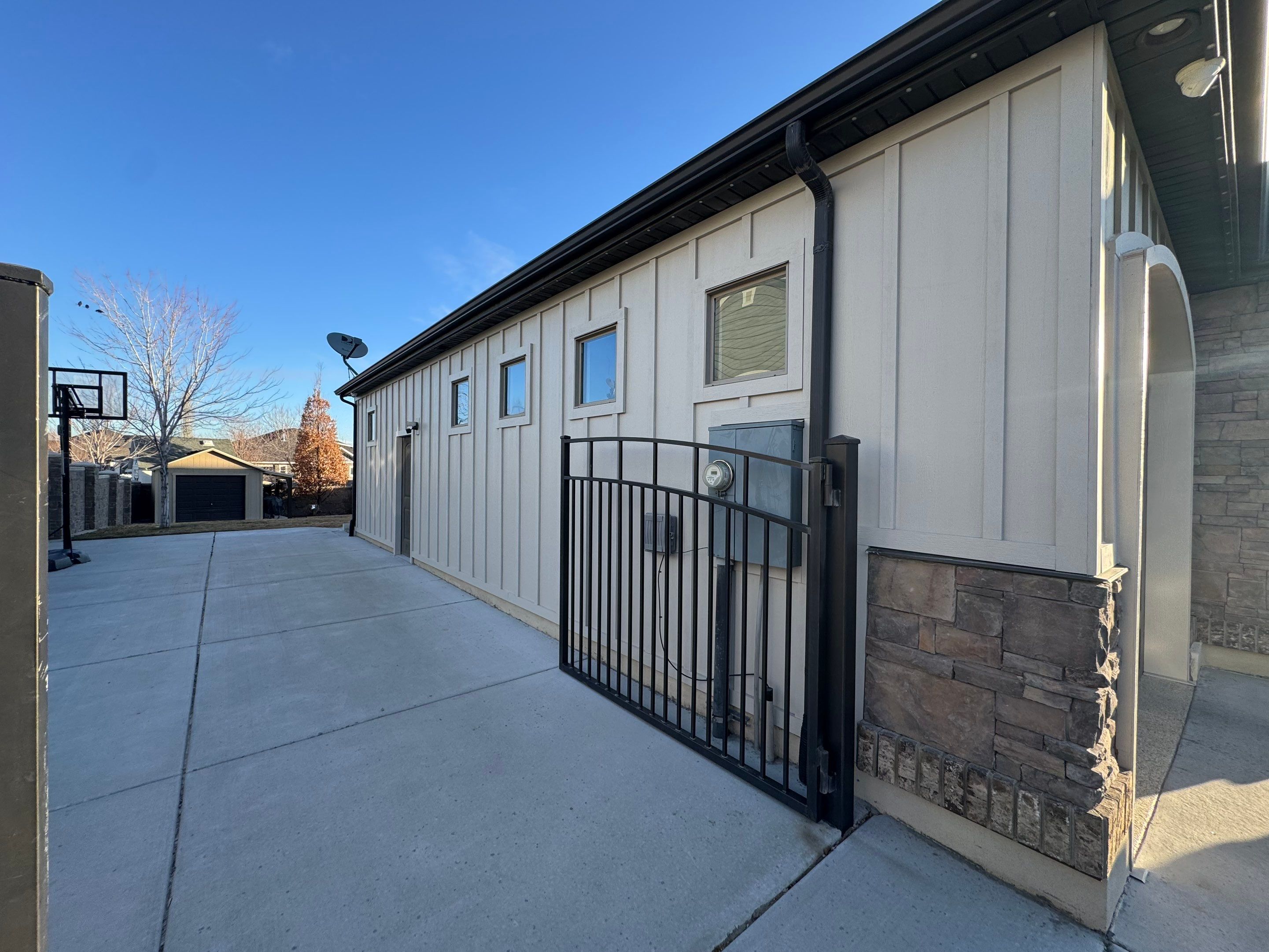 South Jordan | Massive Board & Batten Upgrade | Cobble Stone & Dark Bronze by Ideal Siding Utah