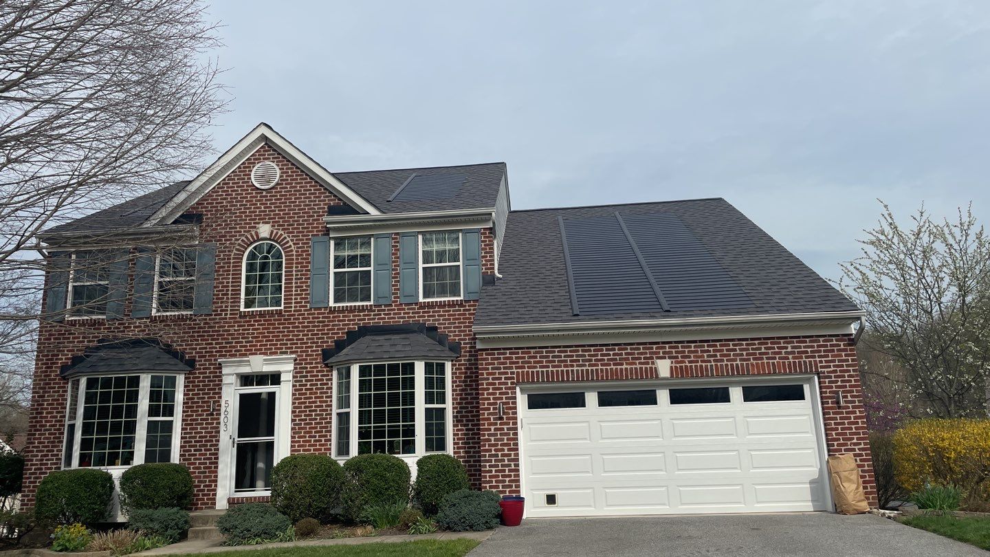 Solar Roof Replacement using GAF Timberline Solar Shingles by American Home Contractors