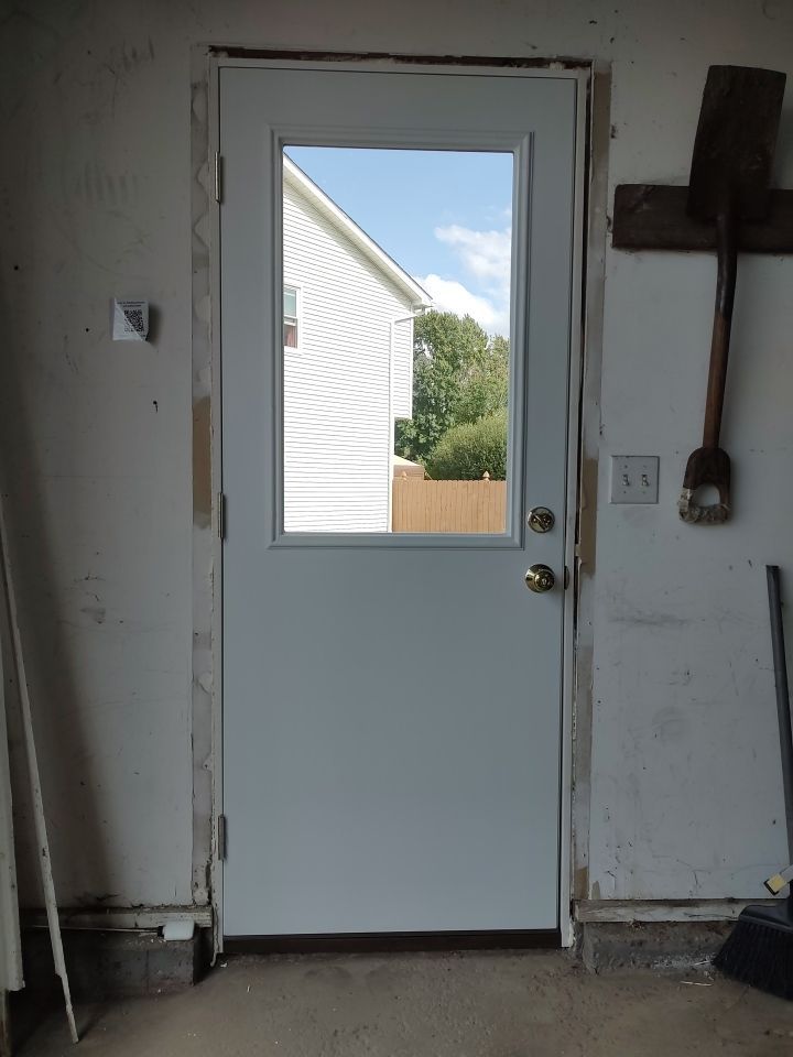 Stamped Concrete and Entry Door by Ivy Lea Construction