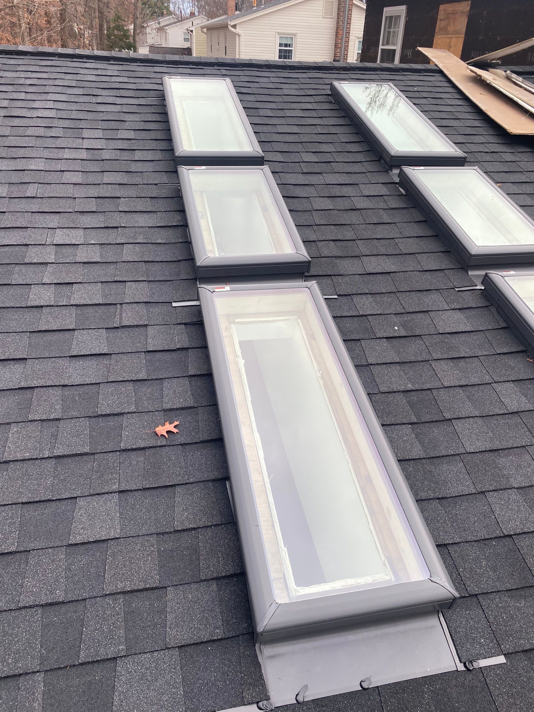 Springfield CertainTeed Charcoal Black Roof & CertainTeed Colonial White Siding by RM Banning, Inc.