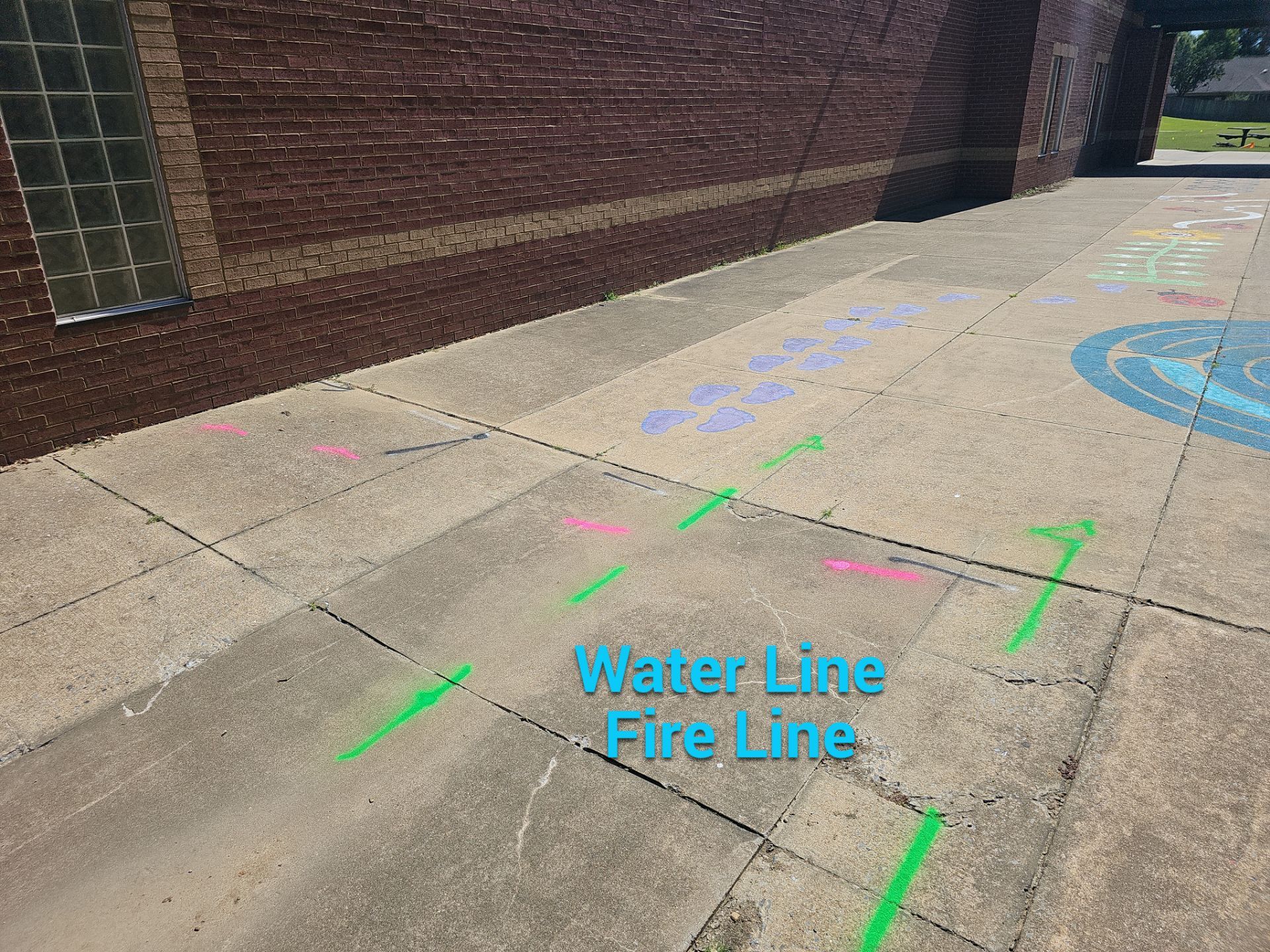 Utility Locating at a school for fence install by Alsip Locating Service, LLC