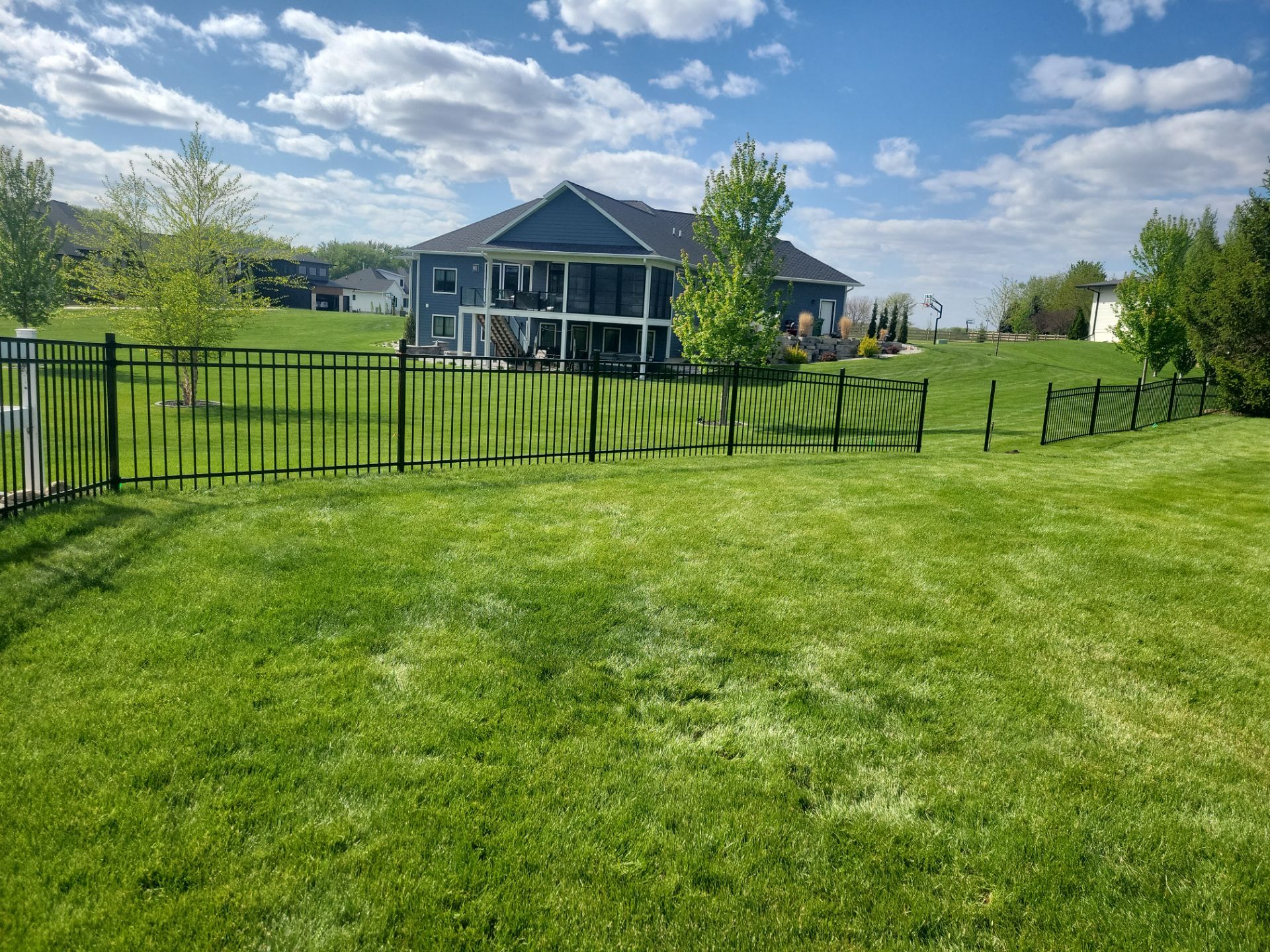 Black Ornamental Metal Picket Fence Installation in Waterloo by Perfect Picket Fence and Stain