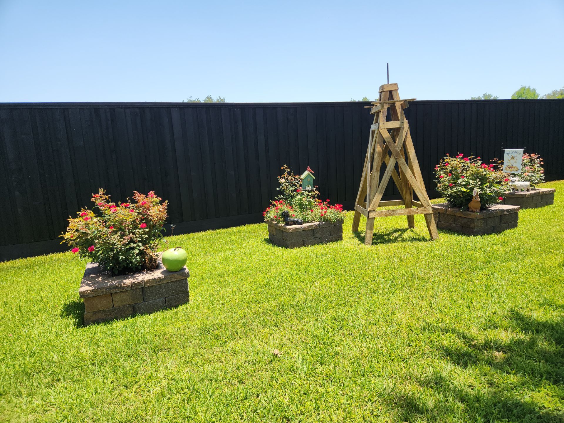 Modern Black Fence Finish by Tim's Fences