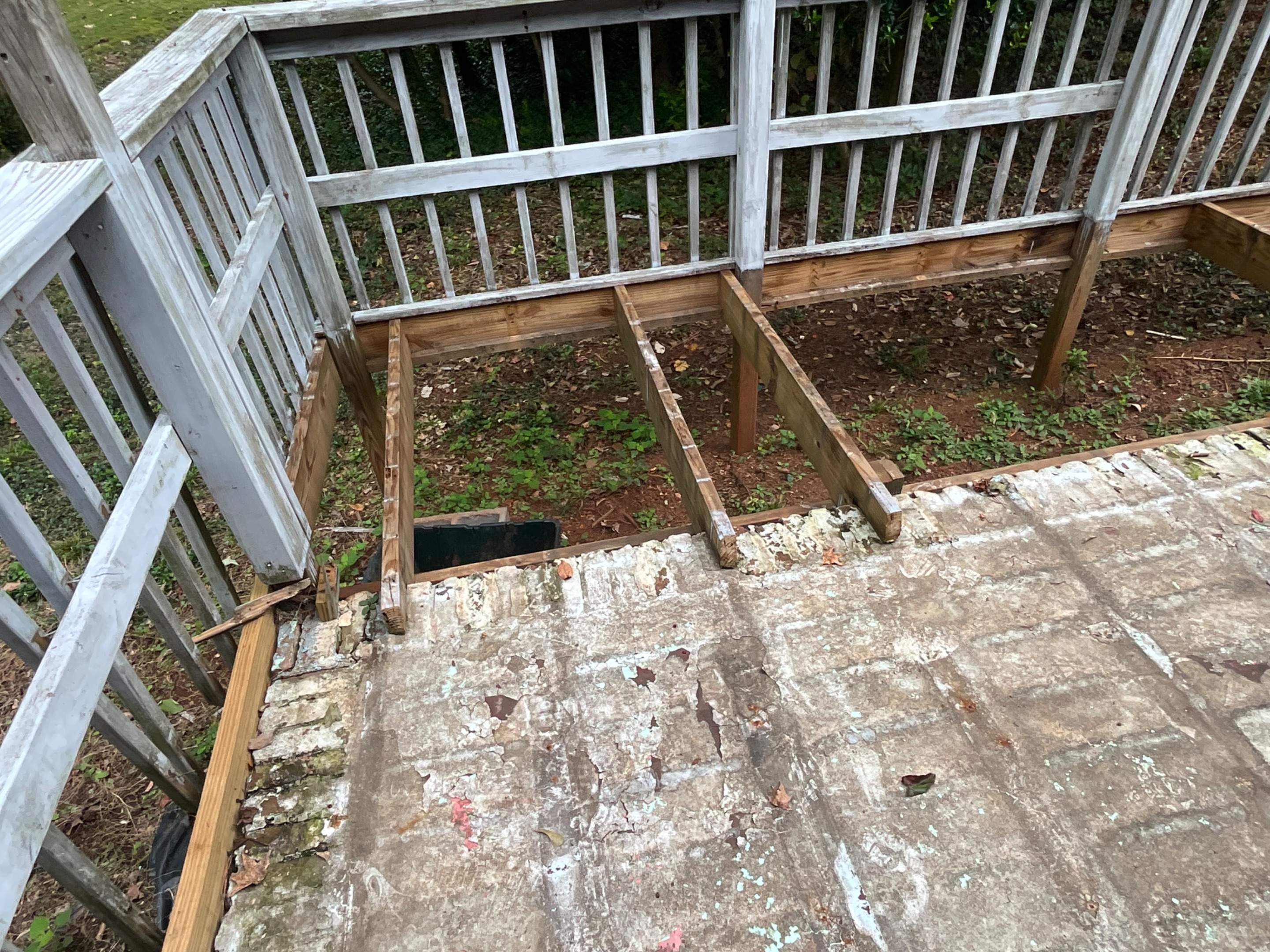 Pressure-Treated Wood Deck Replacement and Railing Installation in Marietta by Swift Home Renovations 