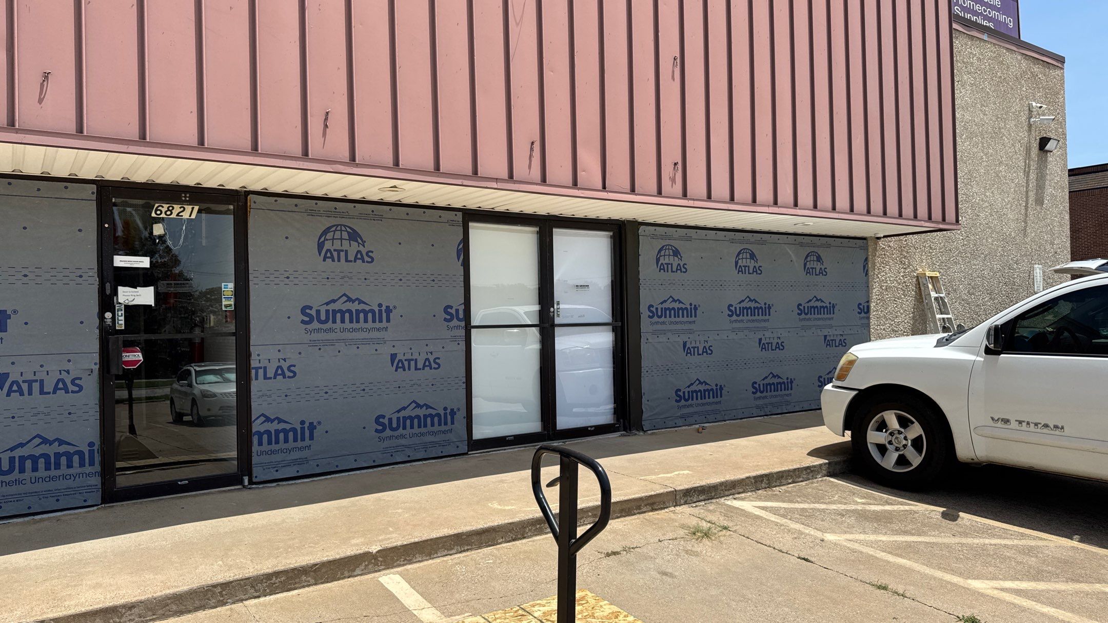 Commercial Building using Various Exterior Products by Harvey Roofing & Construction