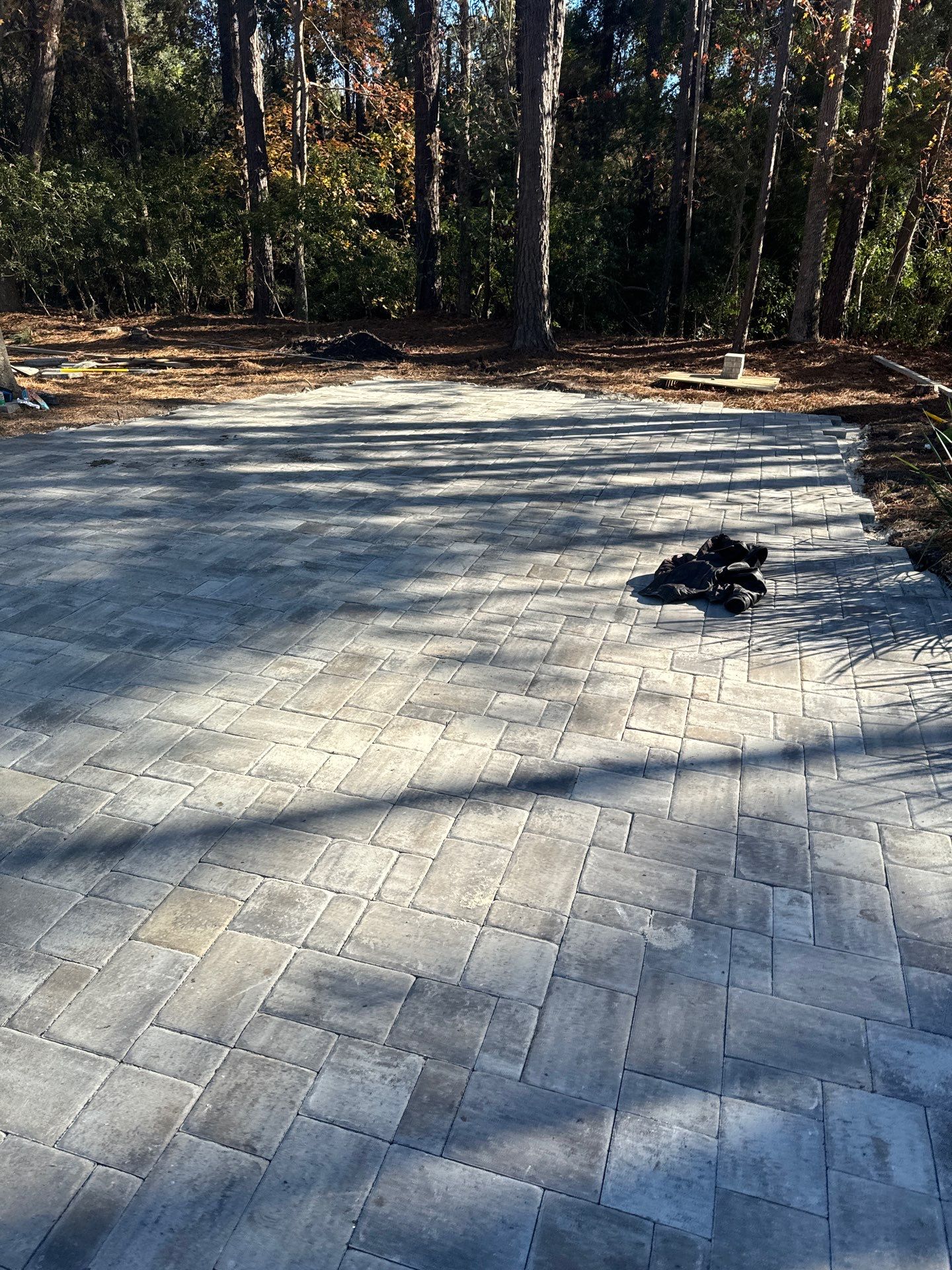 Custom Paver Driveway and Textured Pool Deck Installation in Hilton Head Island by Lowcountry Scapes, LLC