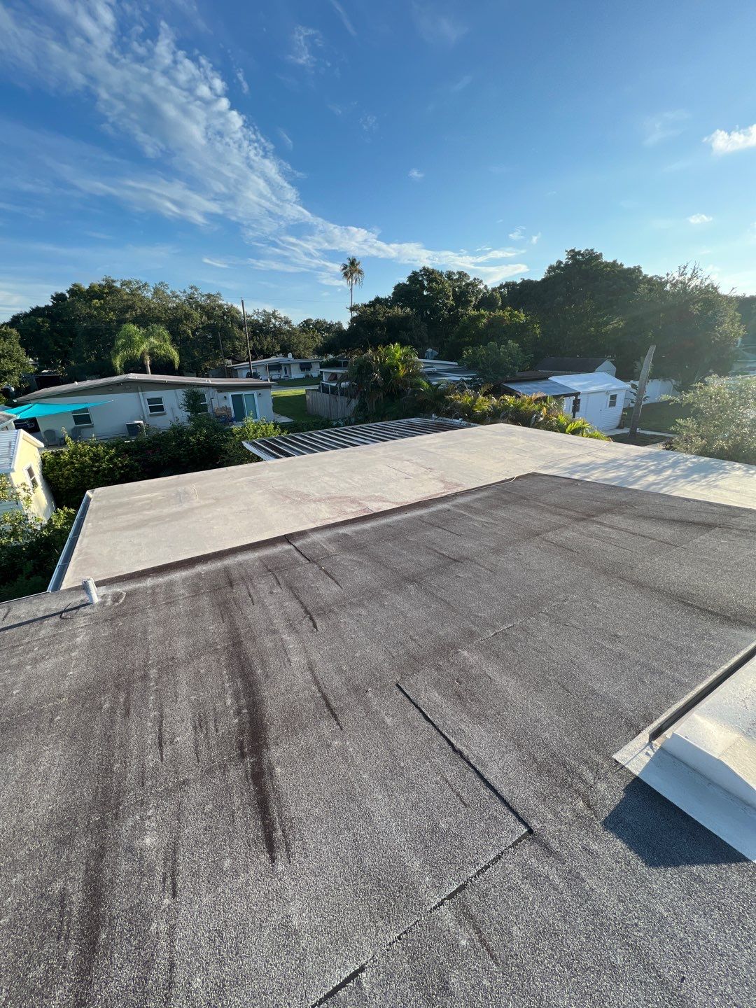 Low Sloped Roof Coating by RoofSmith of Tampa Bay