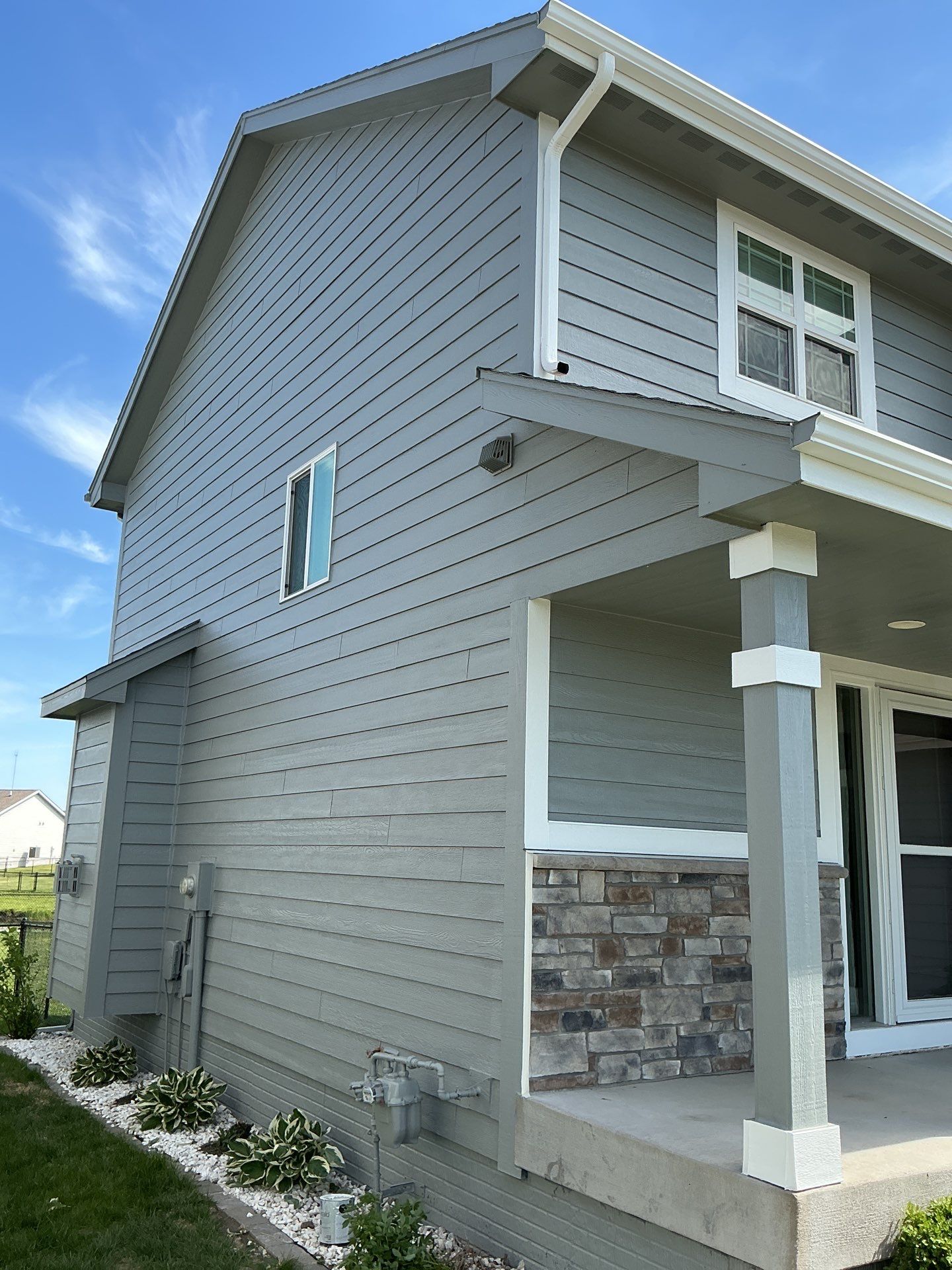 Residential Exterior Repaint in Ankeny by Midwest Paint LLC