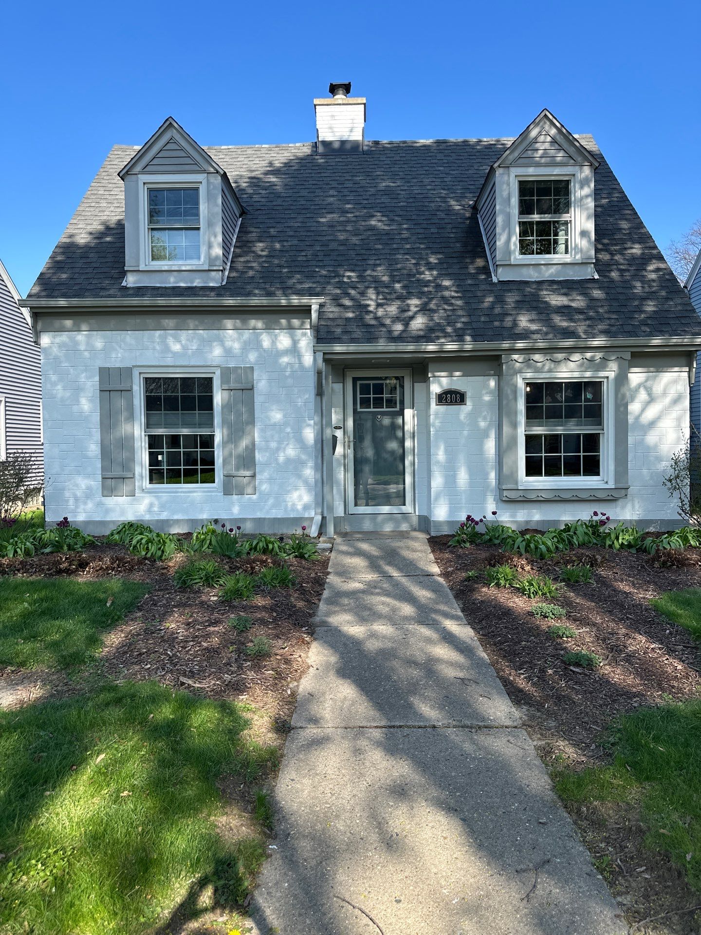 Milwaukee Cape Cod Exterior Renovation and Siding Replacement by OCS Contracting Services