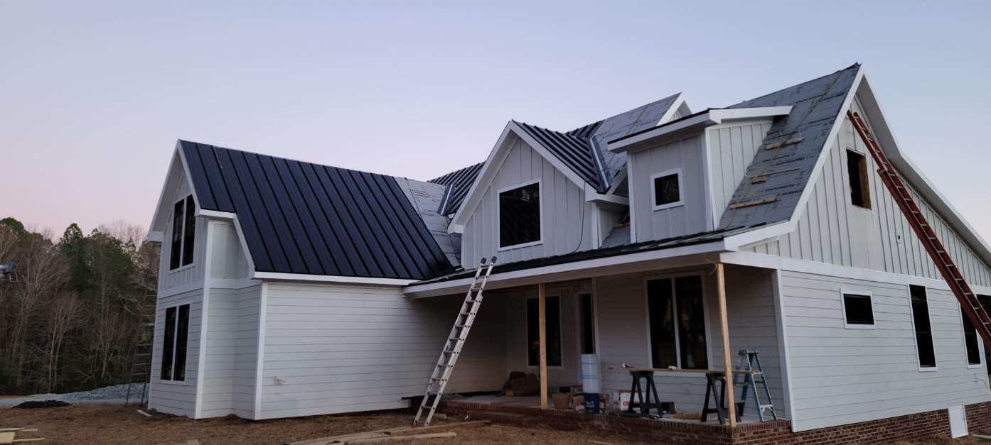 Custom Home Metal Roof Installation by Just In Time Roofing and Restoration
