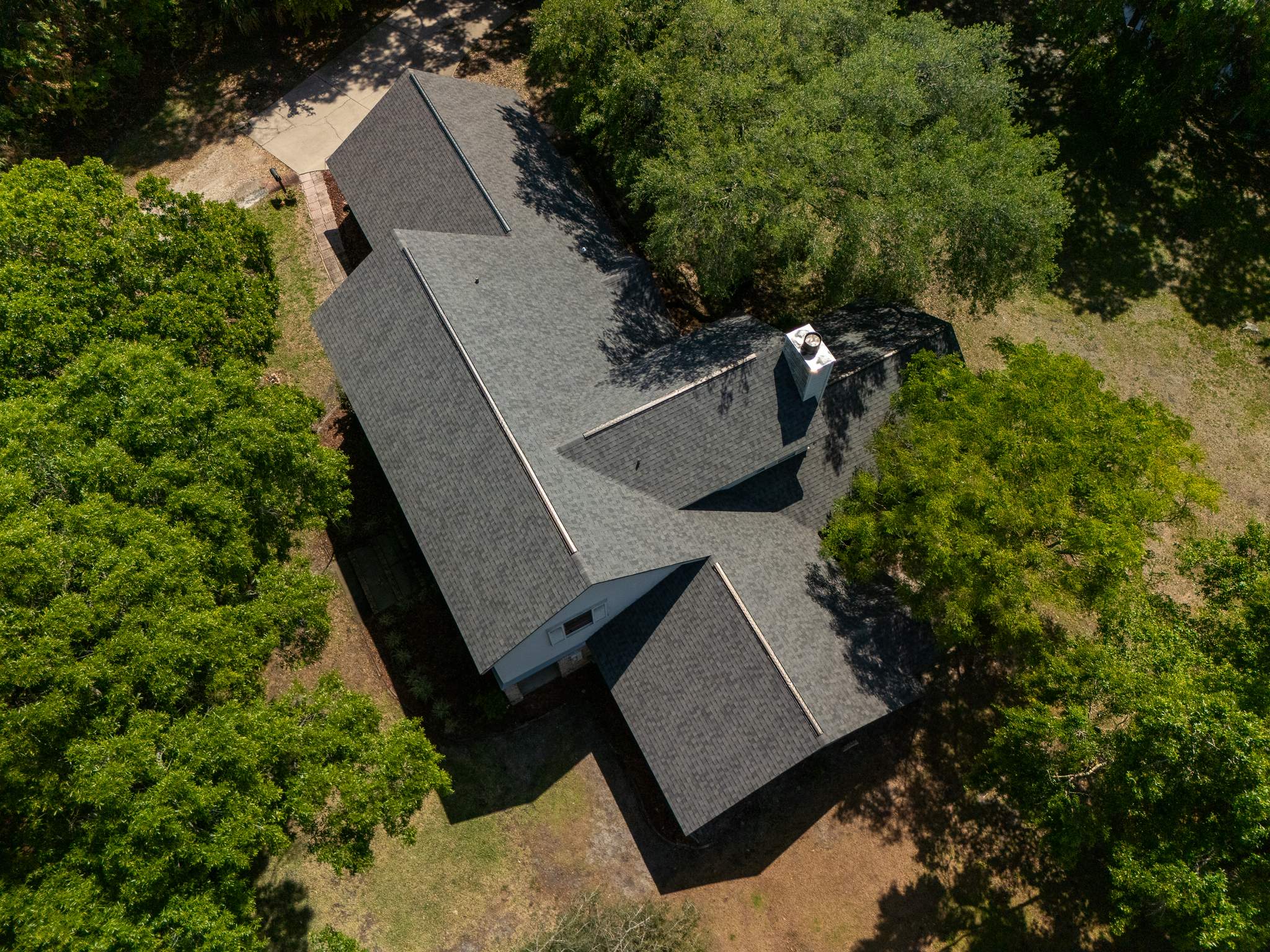 Complete Asphalt Shingle Roof Replacement in Merritt Island, Florida by Wiedmann Construction & Roofing