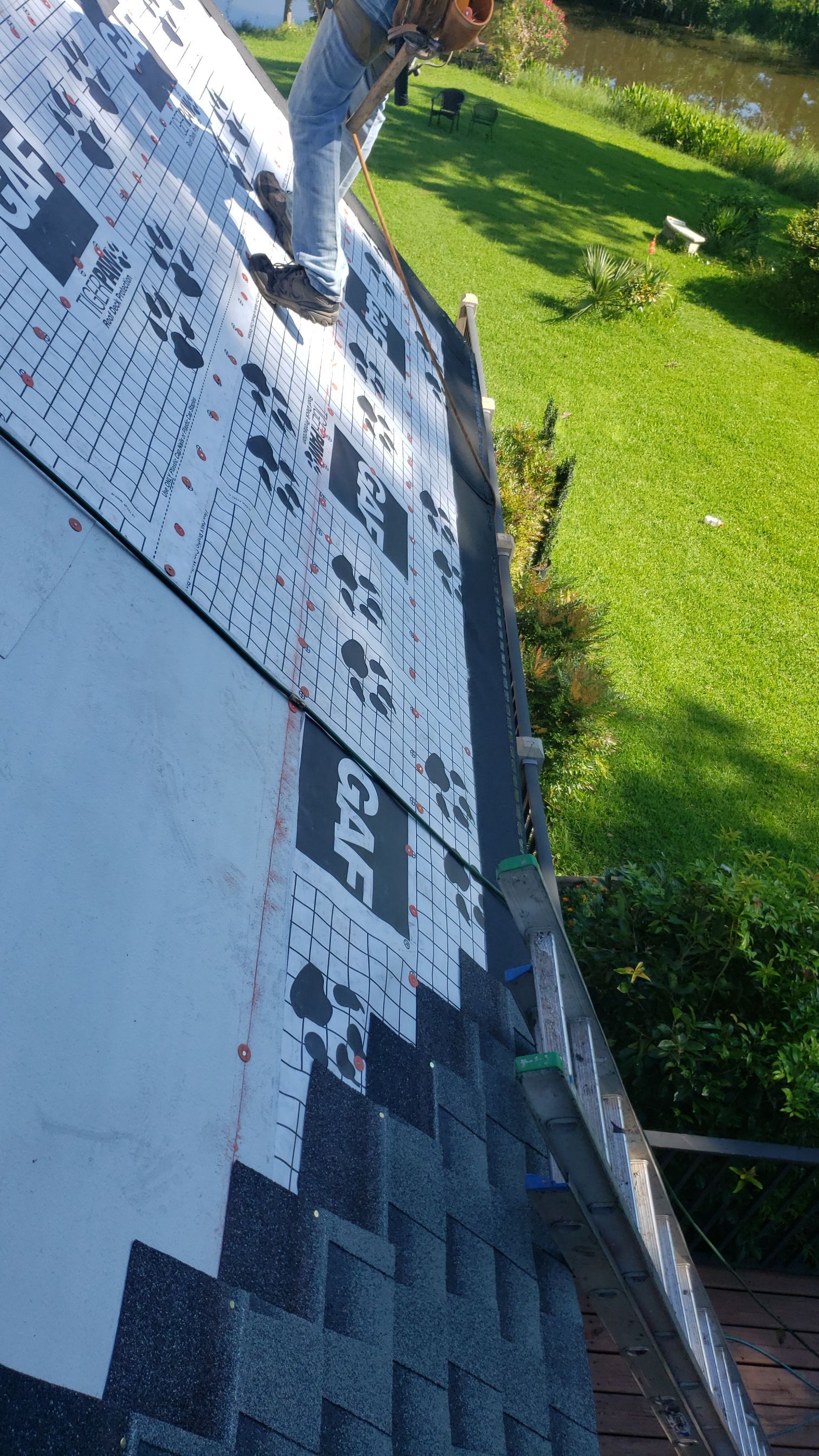Residential Roofing Installation using Roof Replacement by American Roofing & Construction LLC