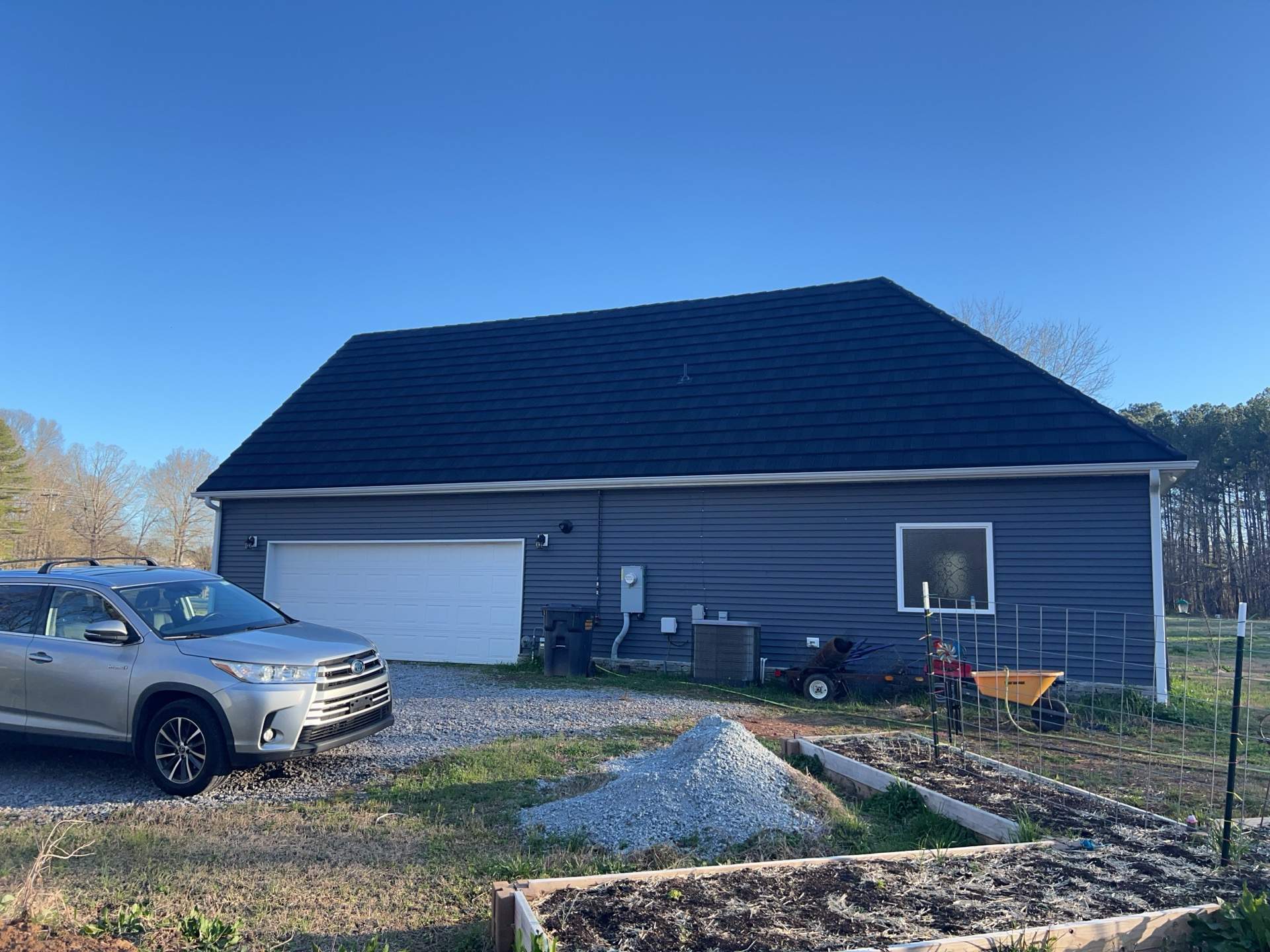 Siding Replacement using James Hardie Countrylane Red by Freedom Exteriors