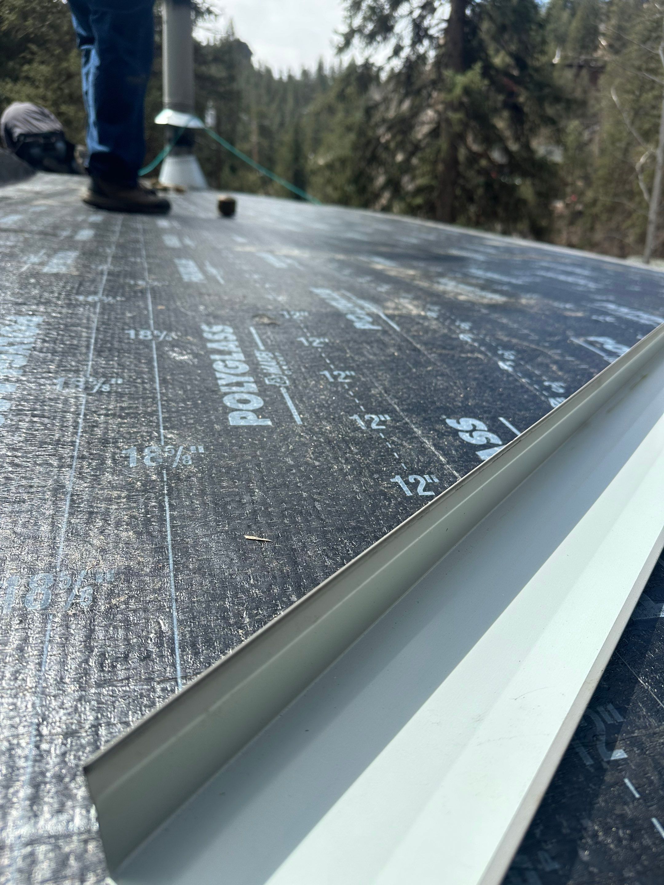 Residential Roofing Installation using Modified Bitumen Roofing by Blue Peaks Roofing LLC 