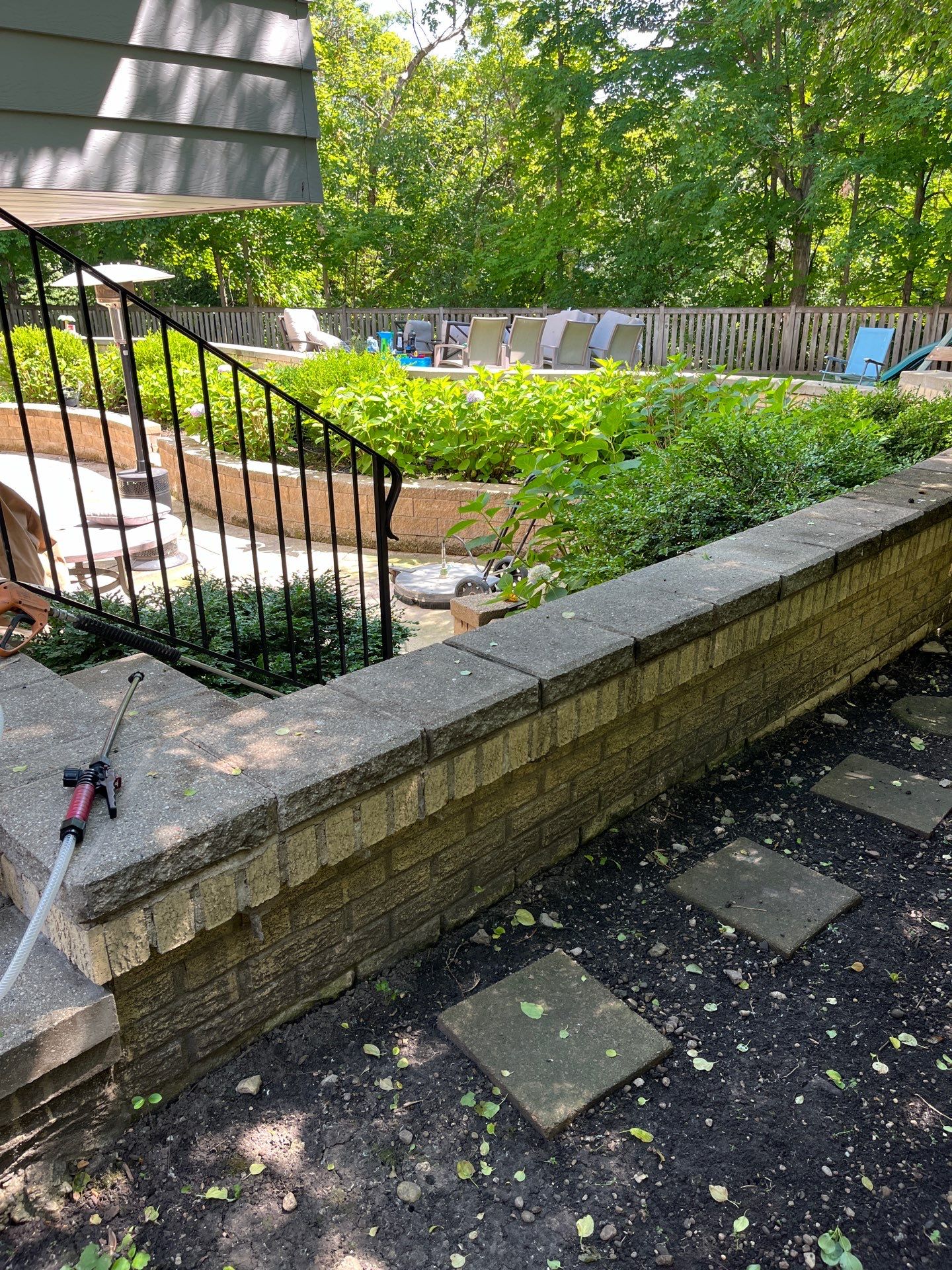 concrete power washing using Algaecide, soft wash soap by Northern Power Washing LLC.