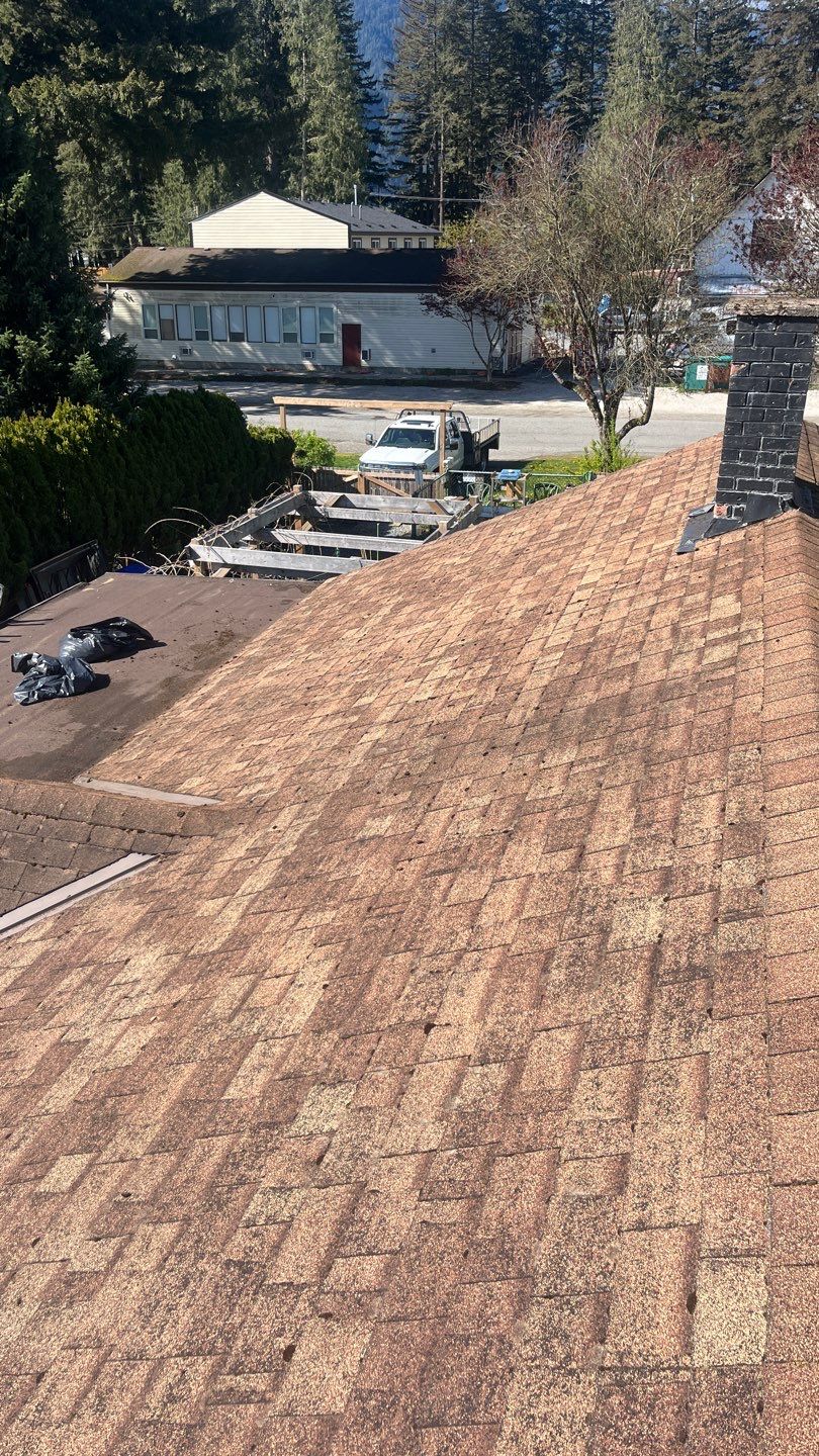 Residential Re-Roof using 12" Prolok metal  by Top Notch Roofing Inc