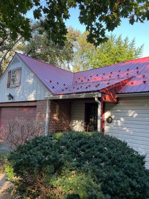 Red Metal Roofing Installation and Trim Restoration in Bernville