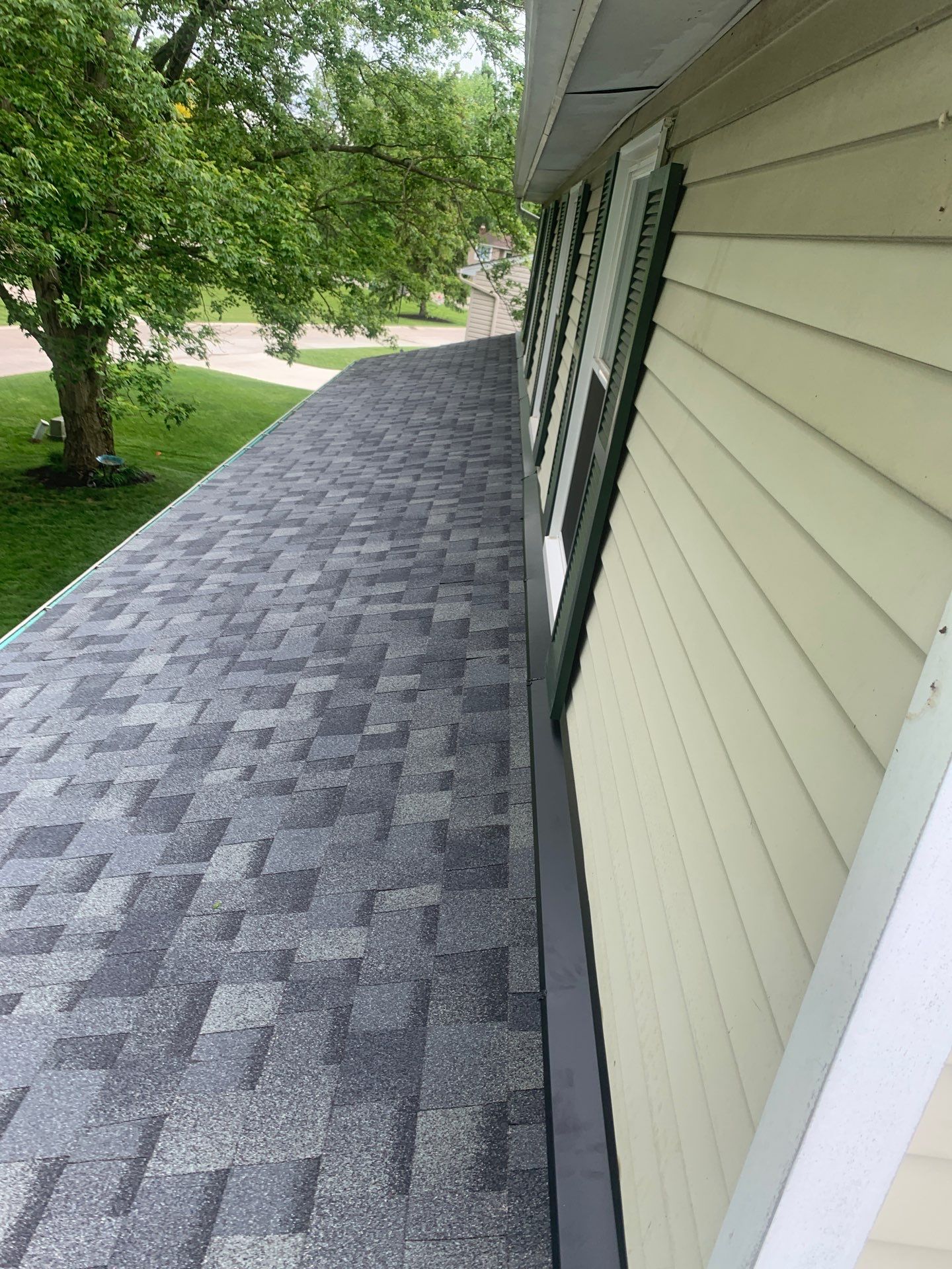 Roof, Siding, & Gutters by Absolute Roofing and Construction