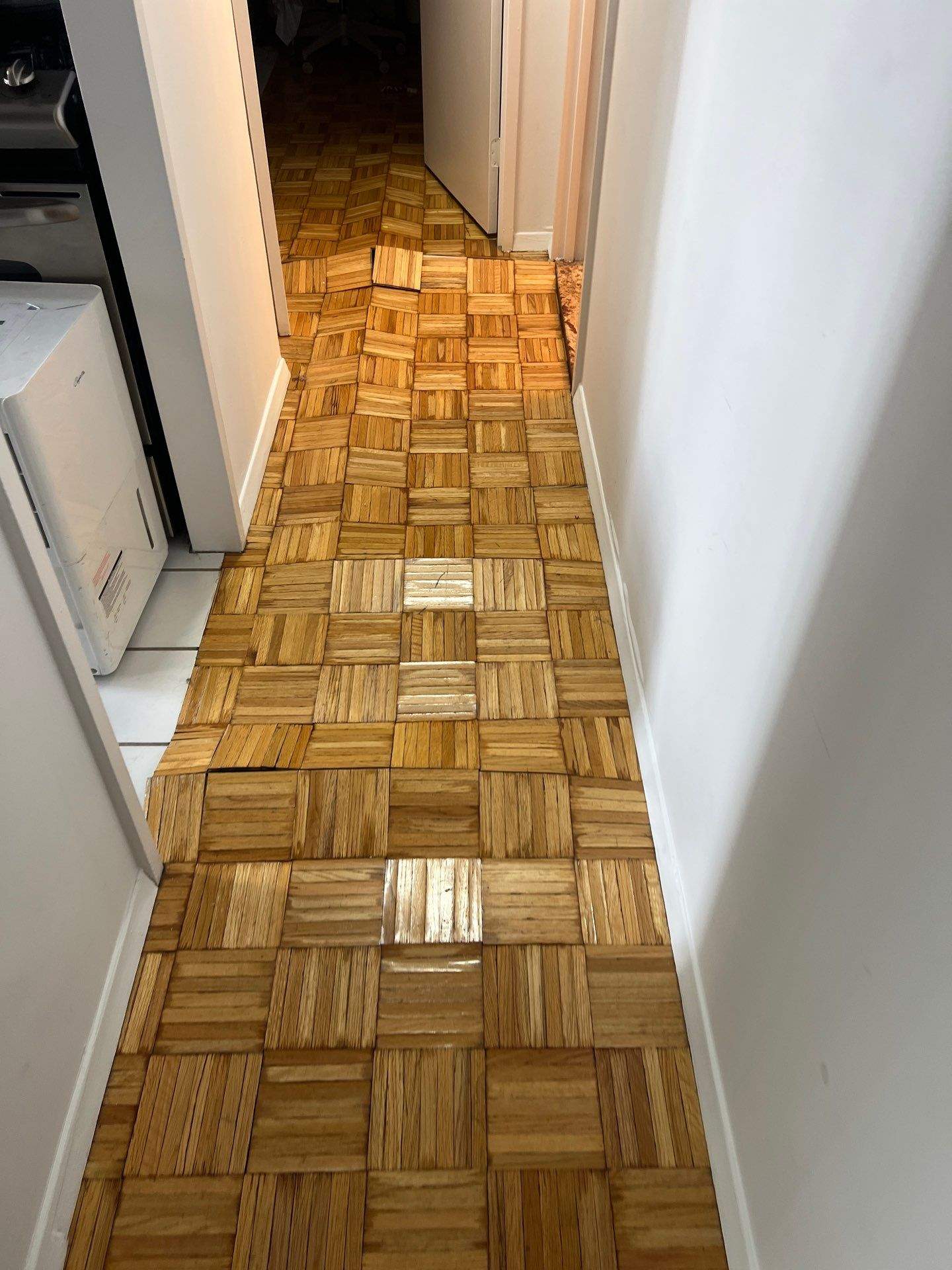 Multi-Unit Water Damage Mitigation and Parquet Floor Restoration in Manhattan by FLAPA & KeyStone