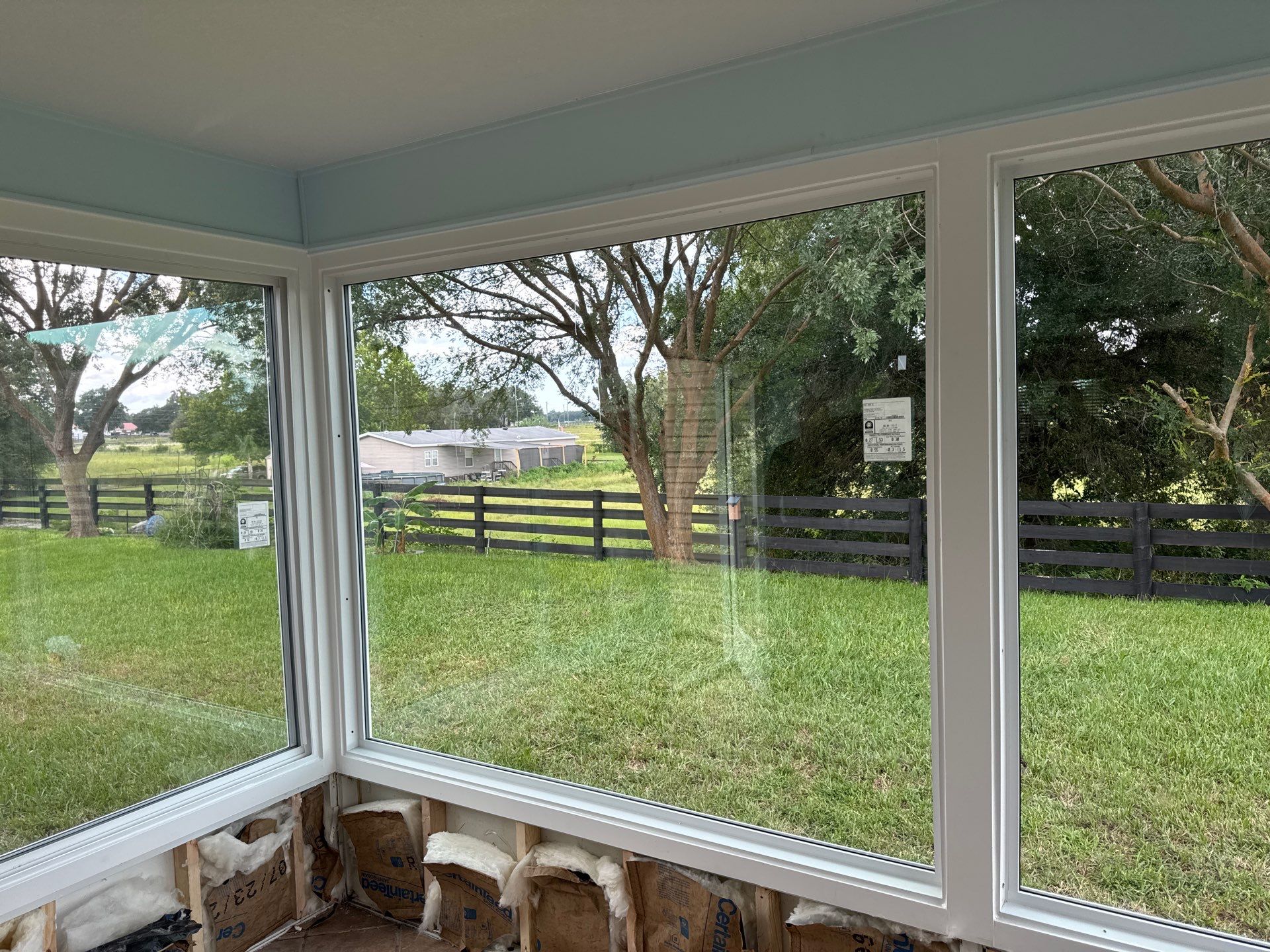 Sunroom Conversion with Alside Windows and Provia Door in The Villages by Windows & Doors Store