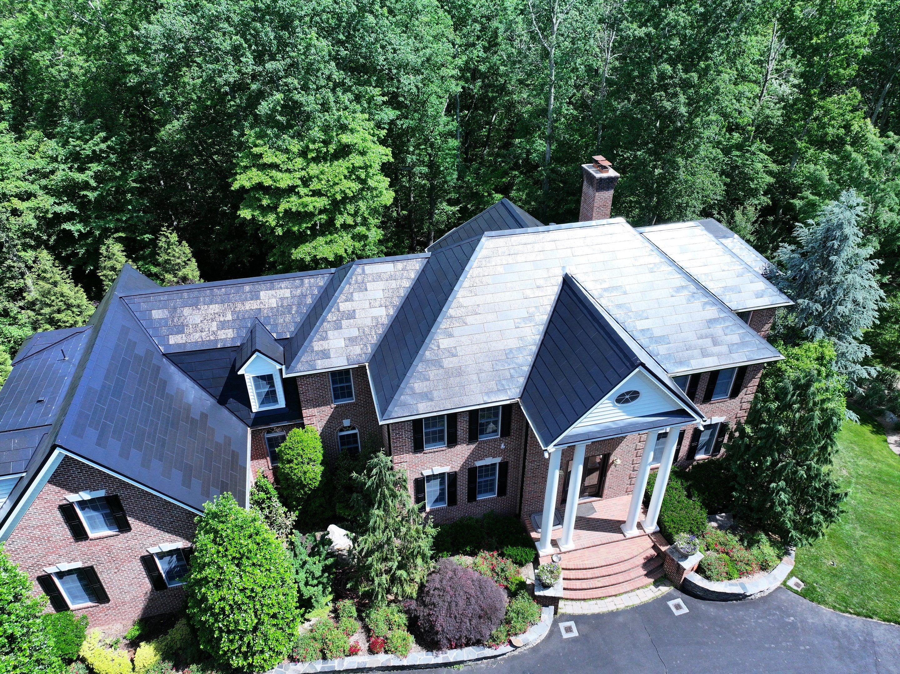 Tesla Solar Roof Replacement by American Home Contractors