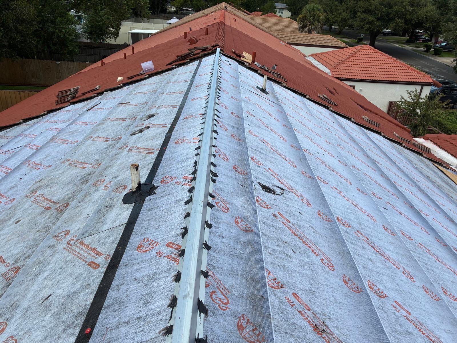 Residential Tile Roof Replacement and Gutter Installation in Winter Park by Pinnacle Roofing Group