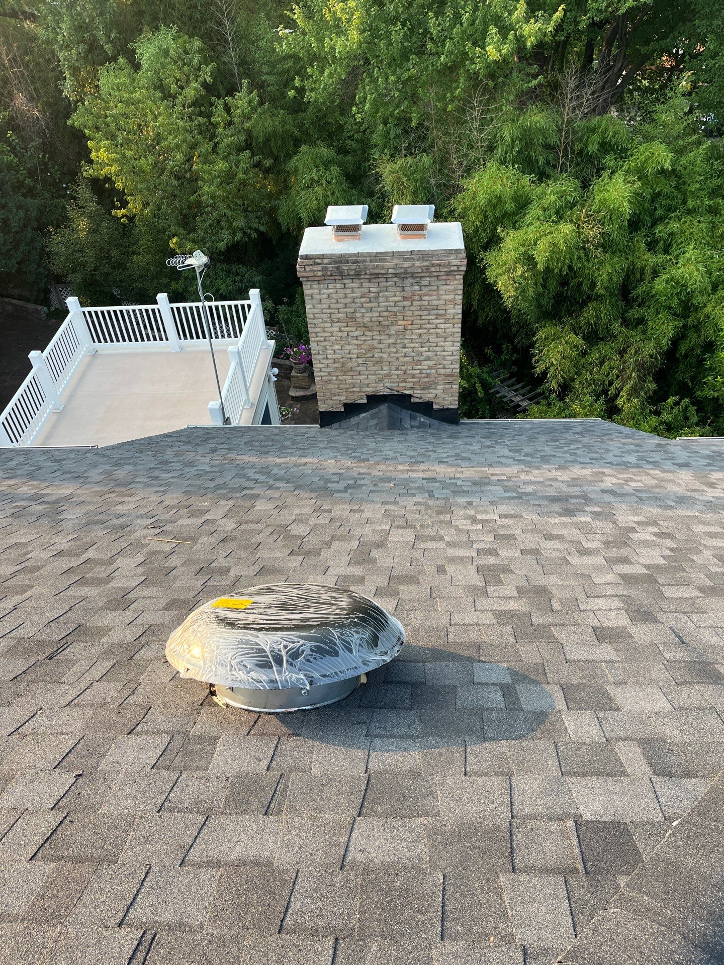 McLean: Residential Roof Installation with Landmark Pro Designer Shingles in Max Def Moire Black by RM Banning, Inc.
