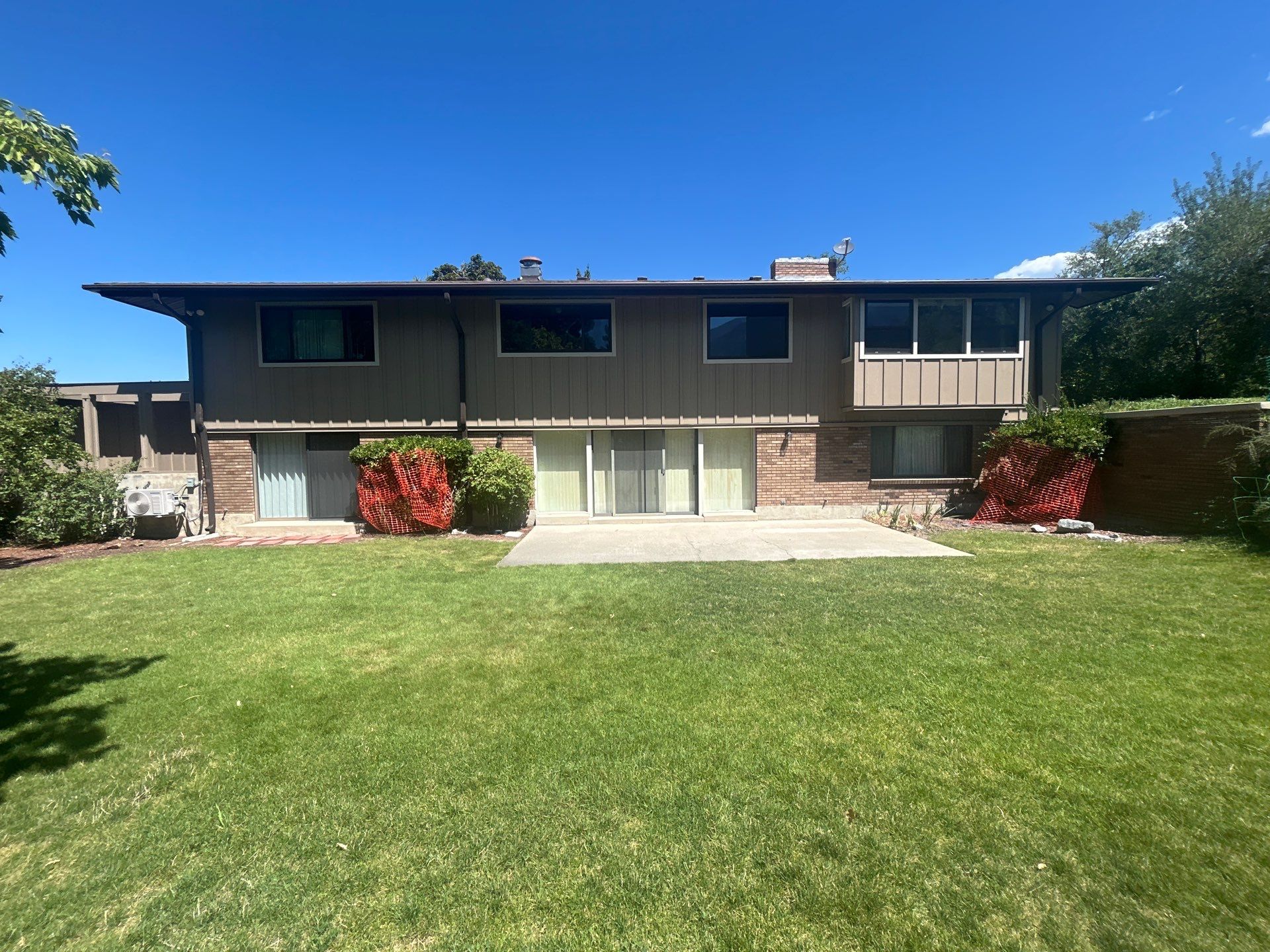 Complete Hardie Colorplus Board and Batten replacement with Custom Soffit Transformation in Sandy by Ideal Siding Utah