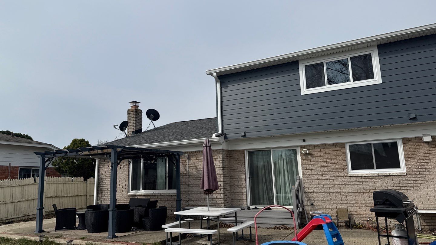 Siding Replacement using Alside Midnight Blue by 180 Contractors