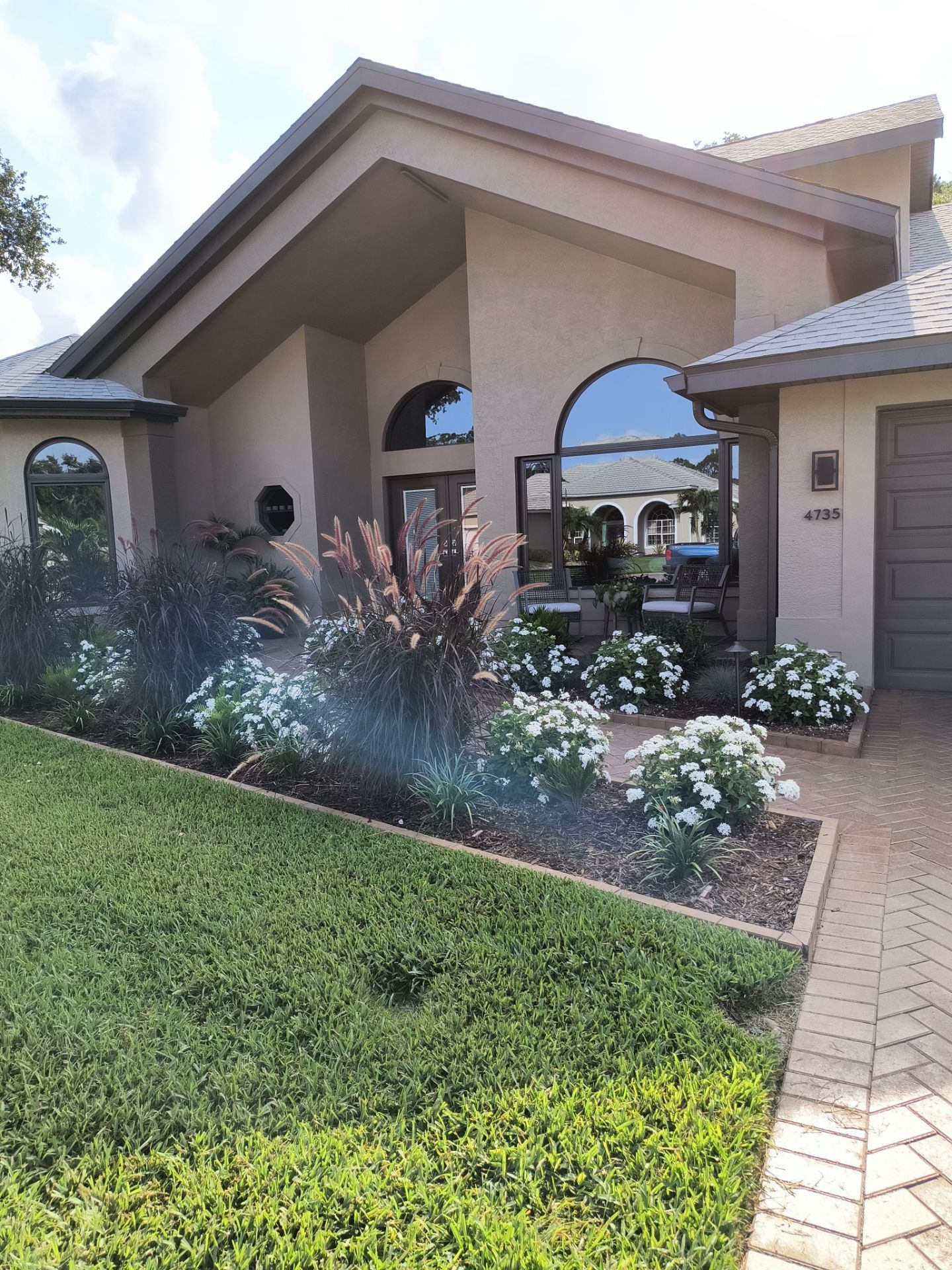 Black Seamless Gutters in Sarasota FL by Gutter Professors