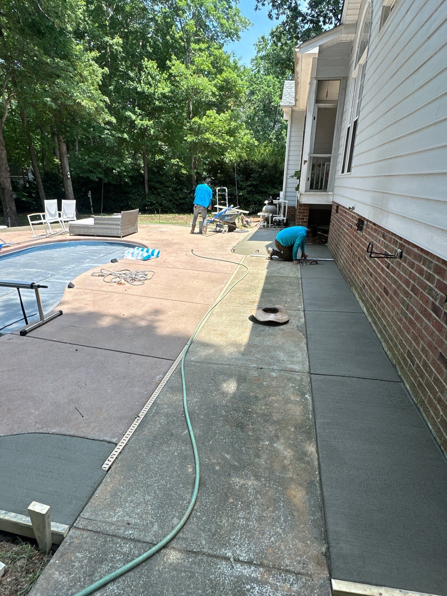 Cool decking pool in Youngsville by Martinez Brother’s Nc Landscaping Inc
