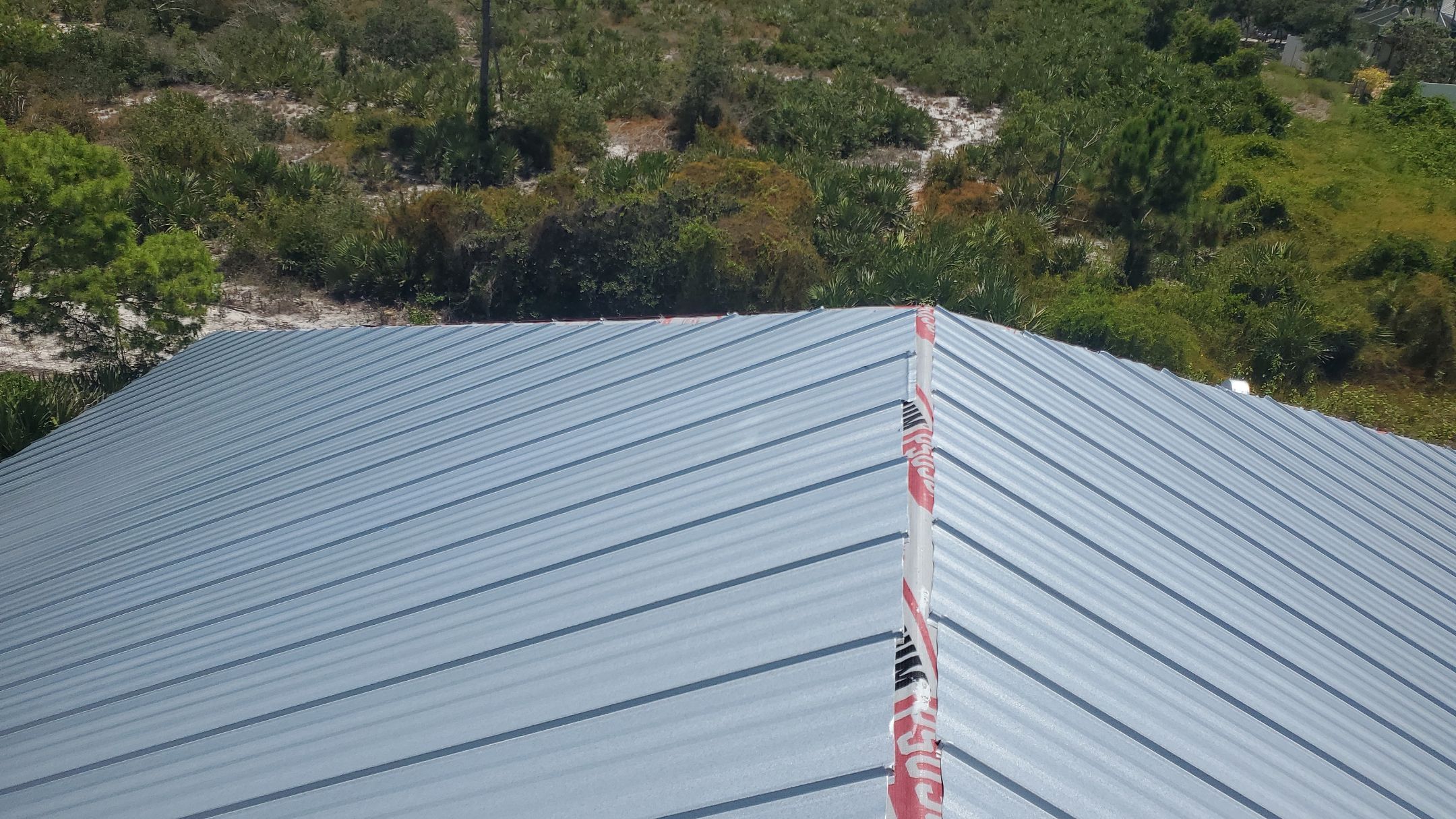 Standing Seam Metal Roof Replacement by Sailfish Roofing