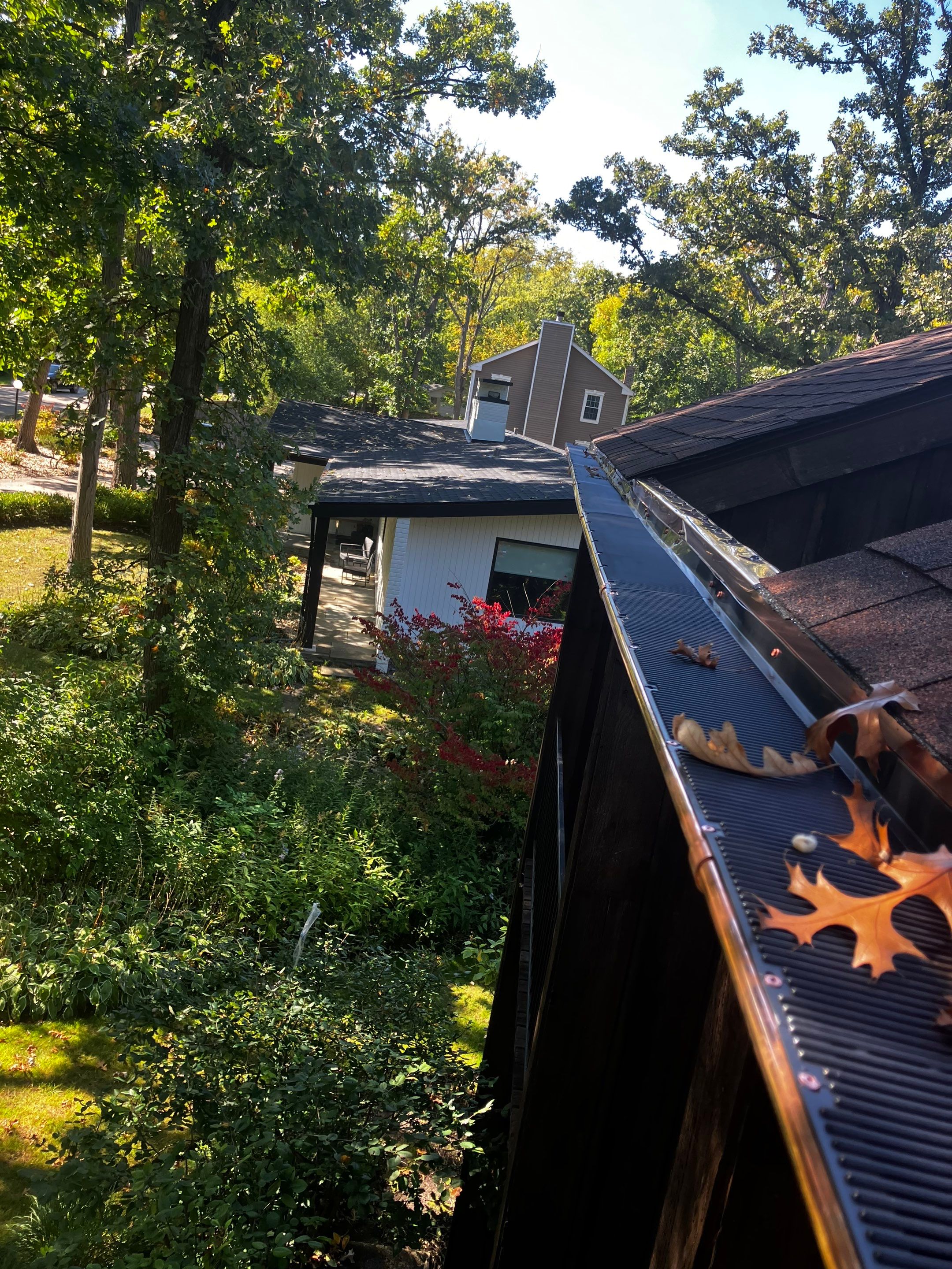 Asphalt Roof Replacement with Half Round Copper Gutter Installment  by Custom Installations, Inc.