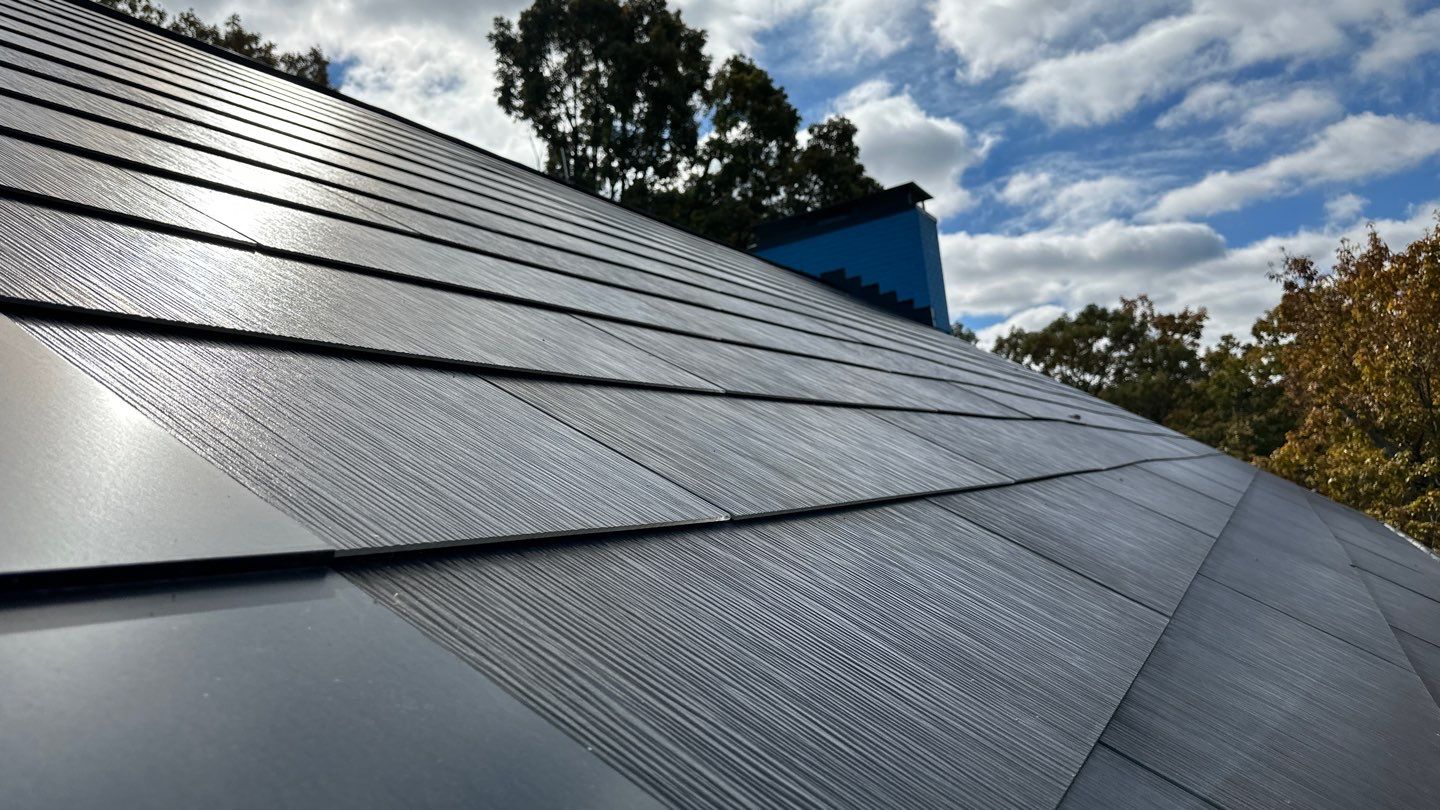 Roof Installation using Tesla Solar Roof V3 by American Home Contractors