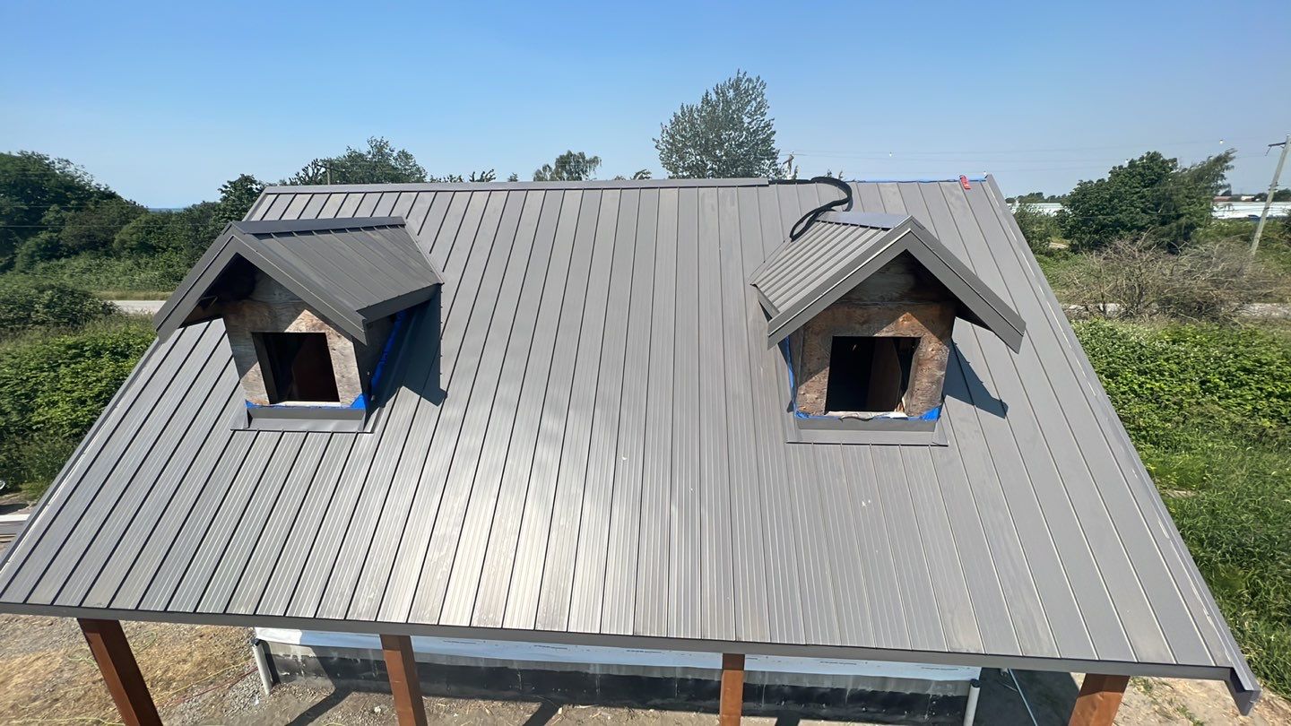 Agricultural Roofing Installation using 12" Prolok metal  by Top Notch Roofing Inc