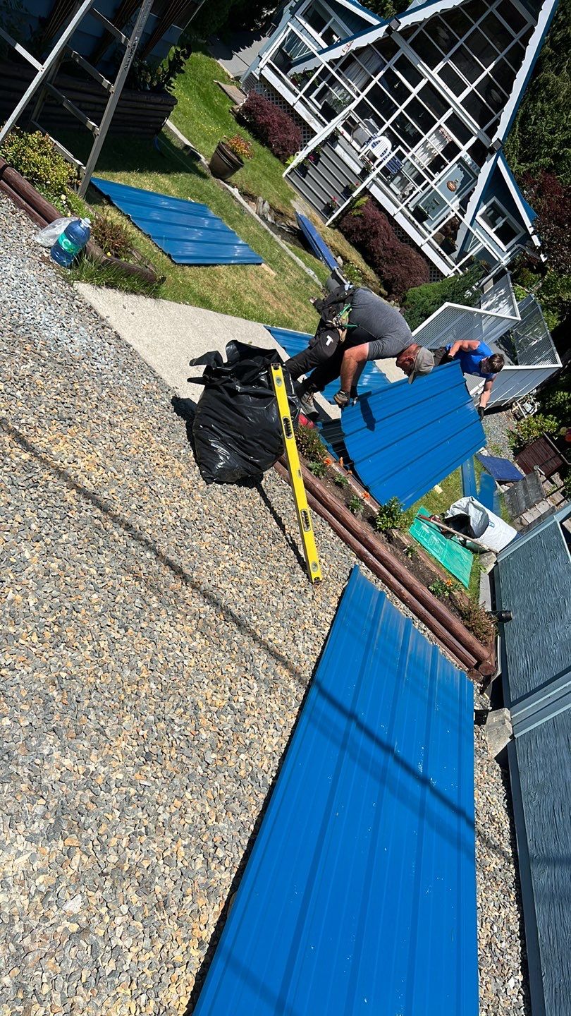 Residential ReRoofing Installation using Duraclad 26ga by Top Notch Roofing Inc