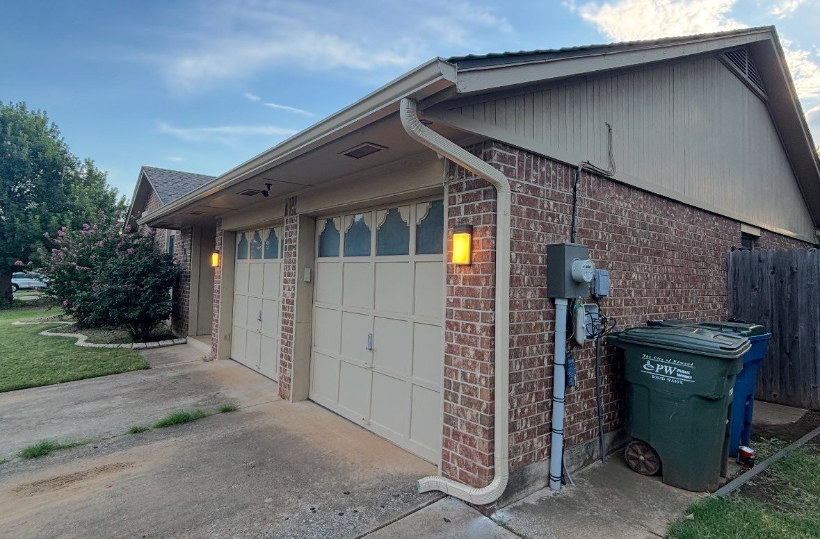 roof and gutter replacement in Edmond by McCann's Roofing and Construction