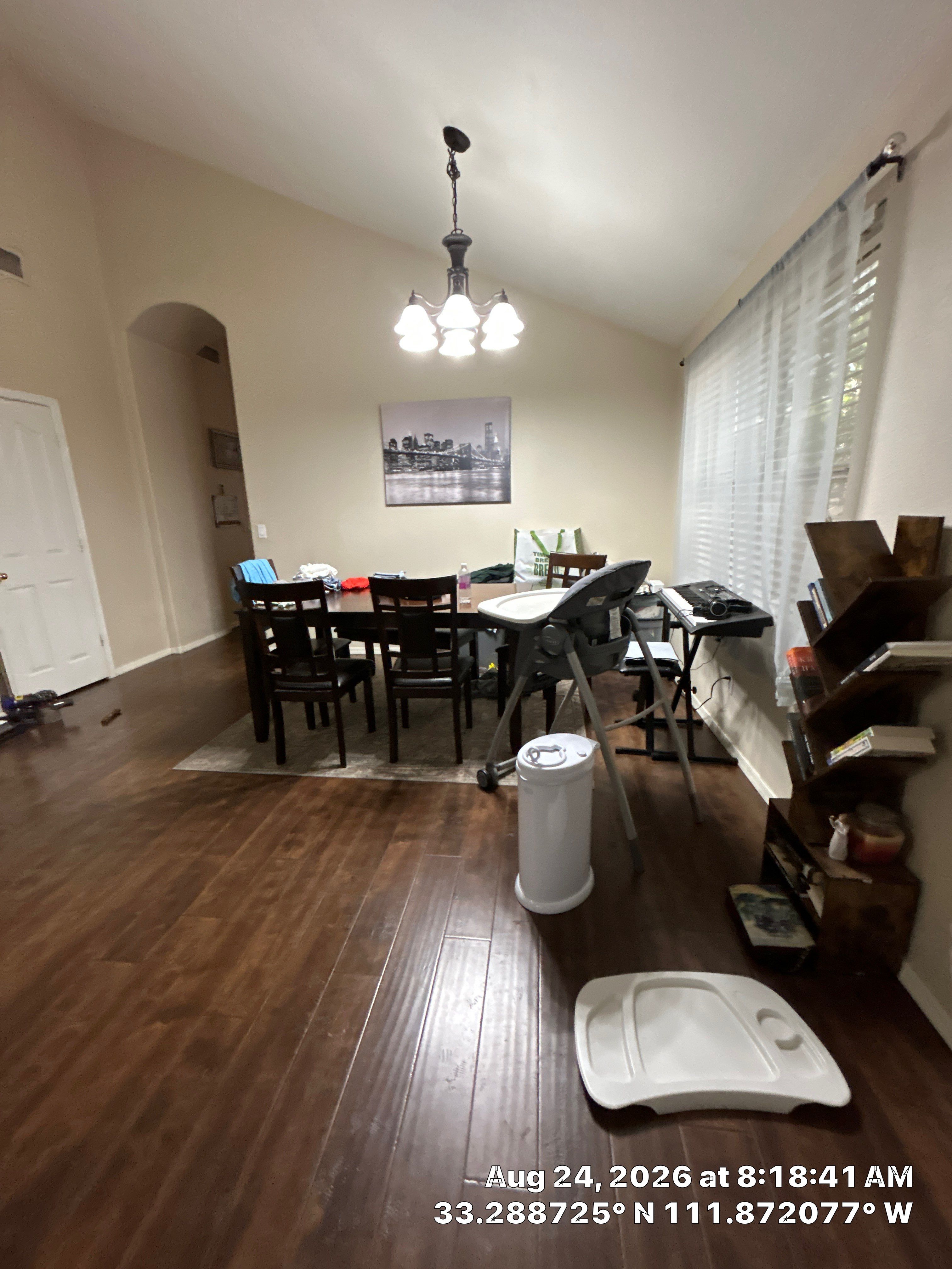 Dining Room Remodel Featuring Dark Wood Laminate Flooring in Chandler by CompanyCam Sales Demo