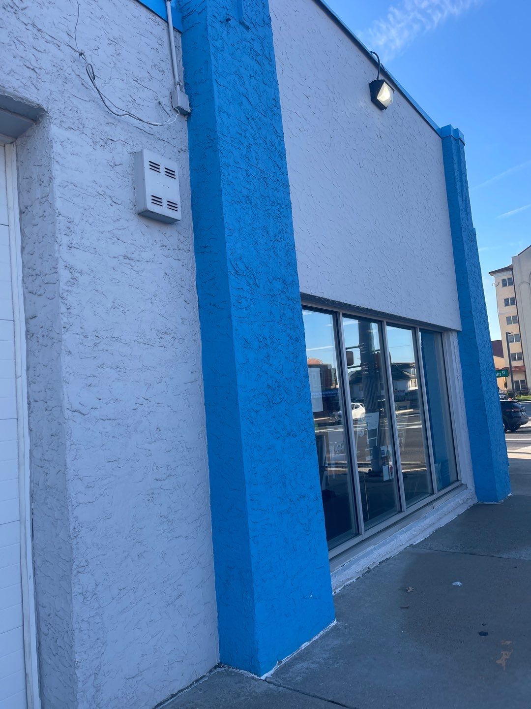 Building SoftWash & Concrete Cleaning  by SJ Exterior